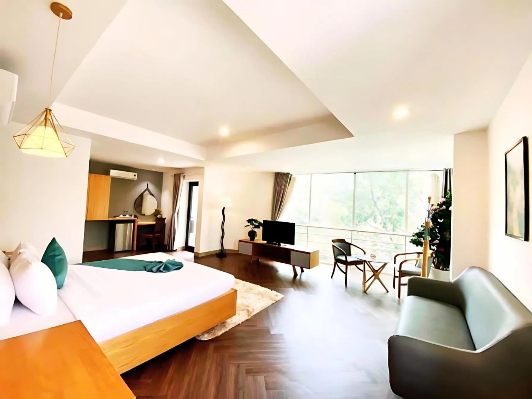 Bed in Happy Life Green Hotel