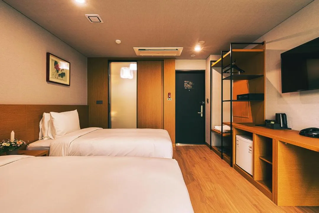 Bed in Kwangsu Hotel Haeundae