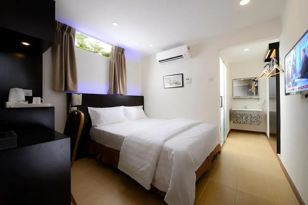 Bed in ERNES Hotel Bayu Mutiara Bed in ERNES Hotel Bayu Mutiara