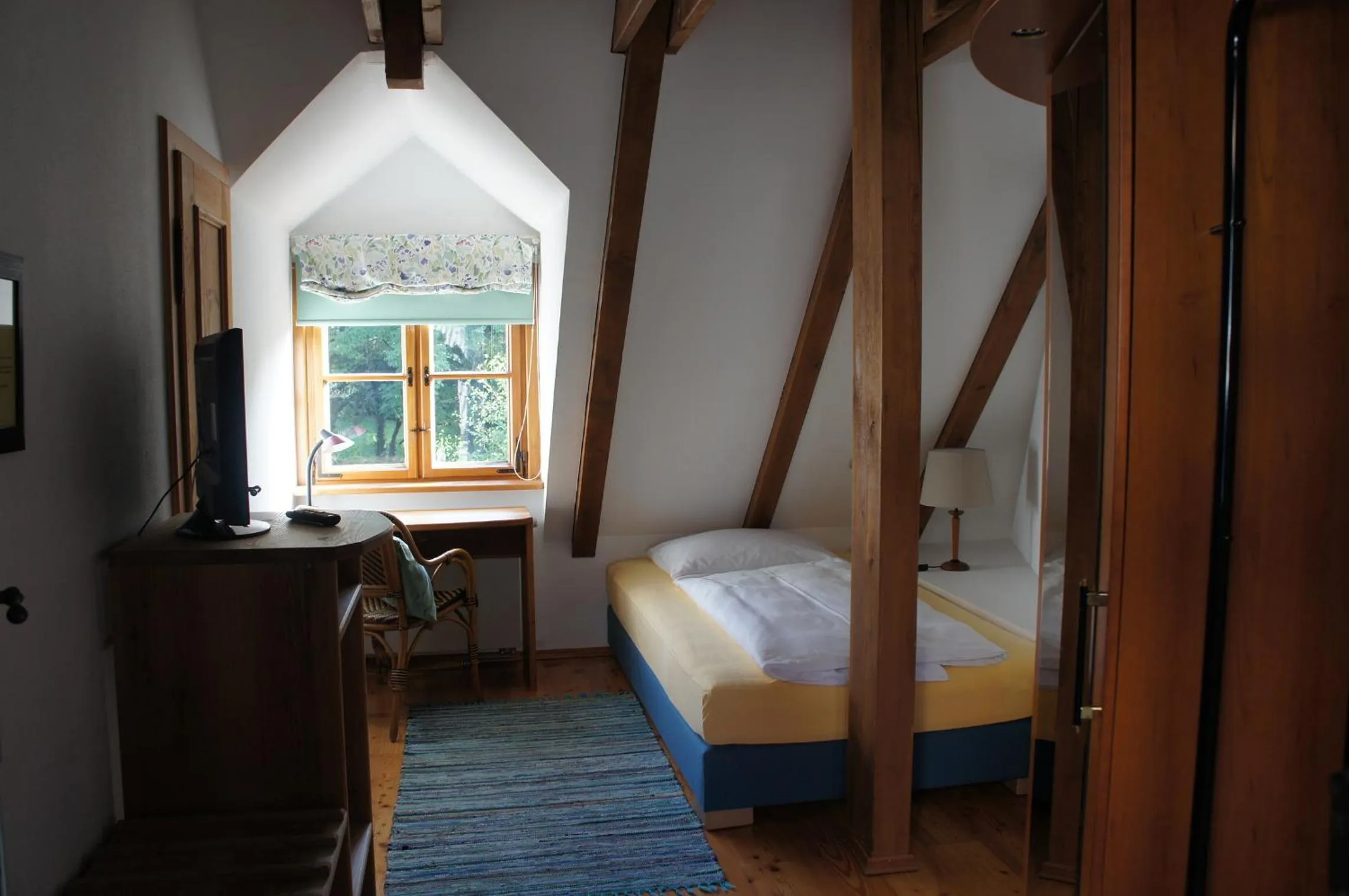 Photo of the whole room, Bed in Hotel Schwarzer Adler