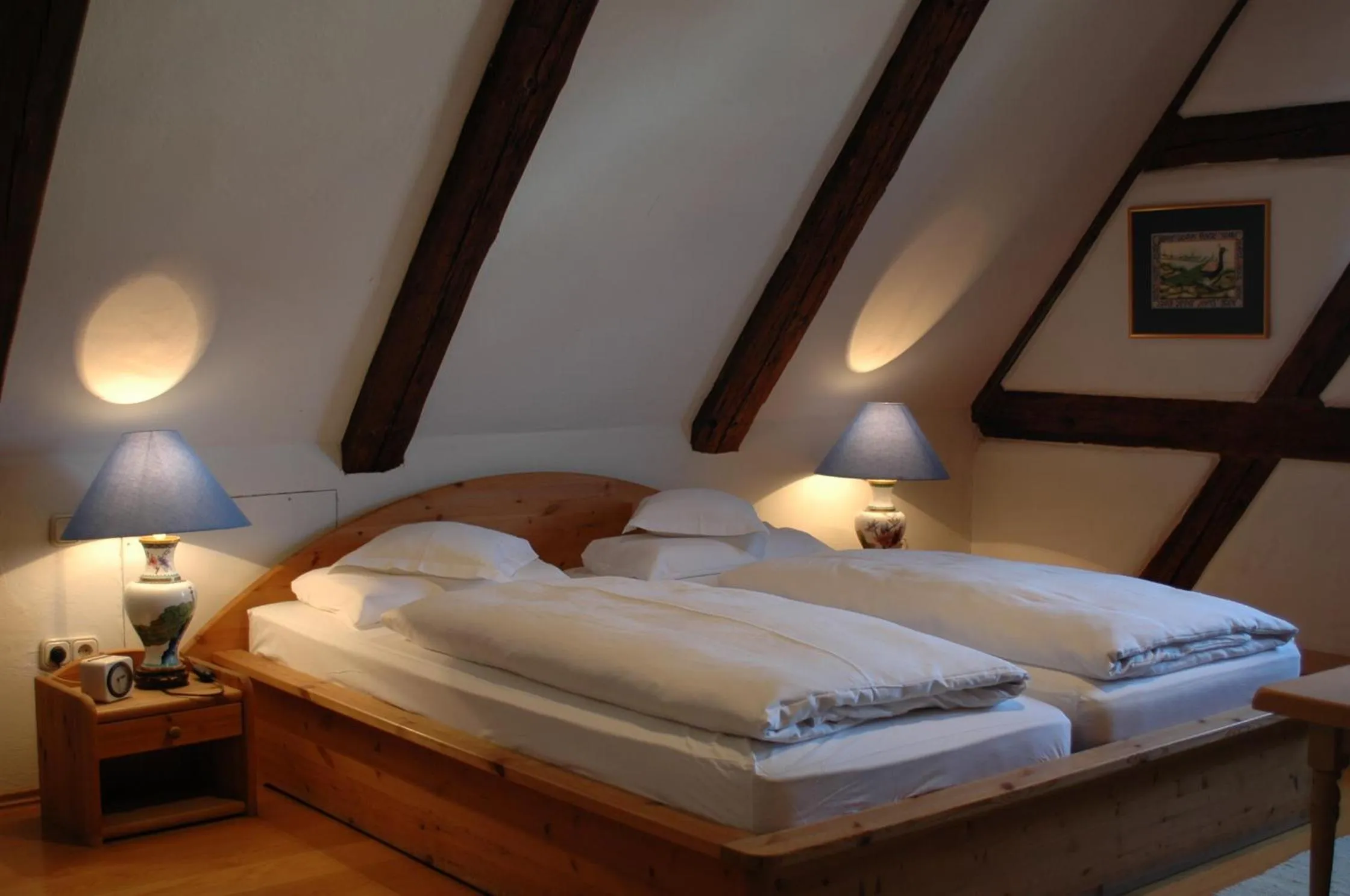 Bed in Hotel Schwarzer Adler