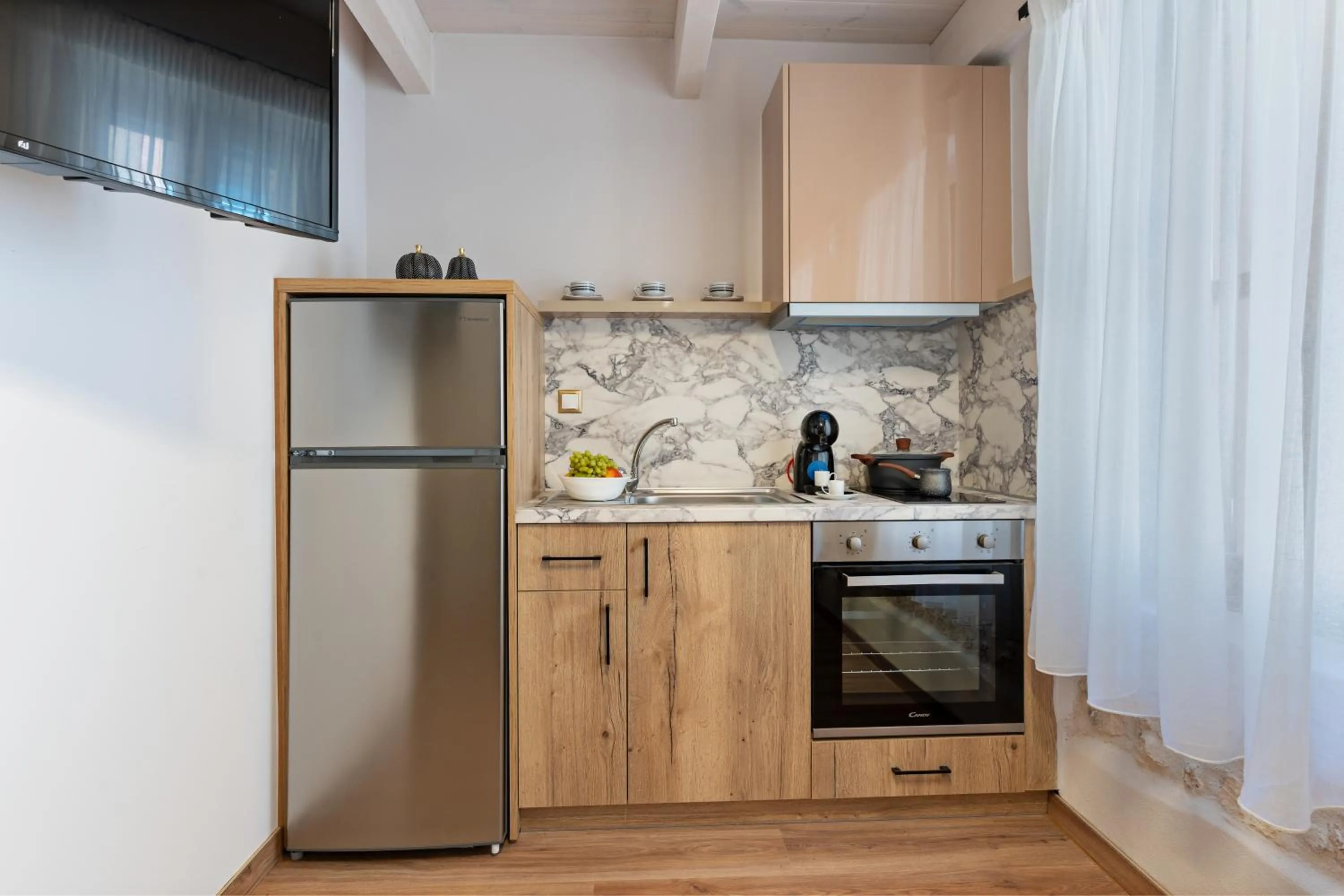 Kitchen or kitchenette in Erotokritos City Luxury Suites