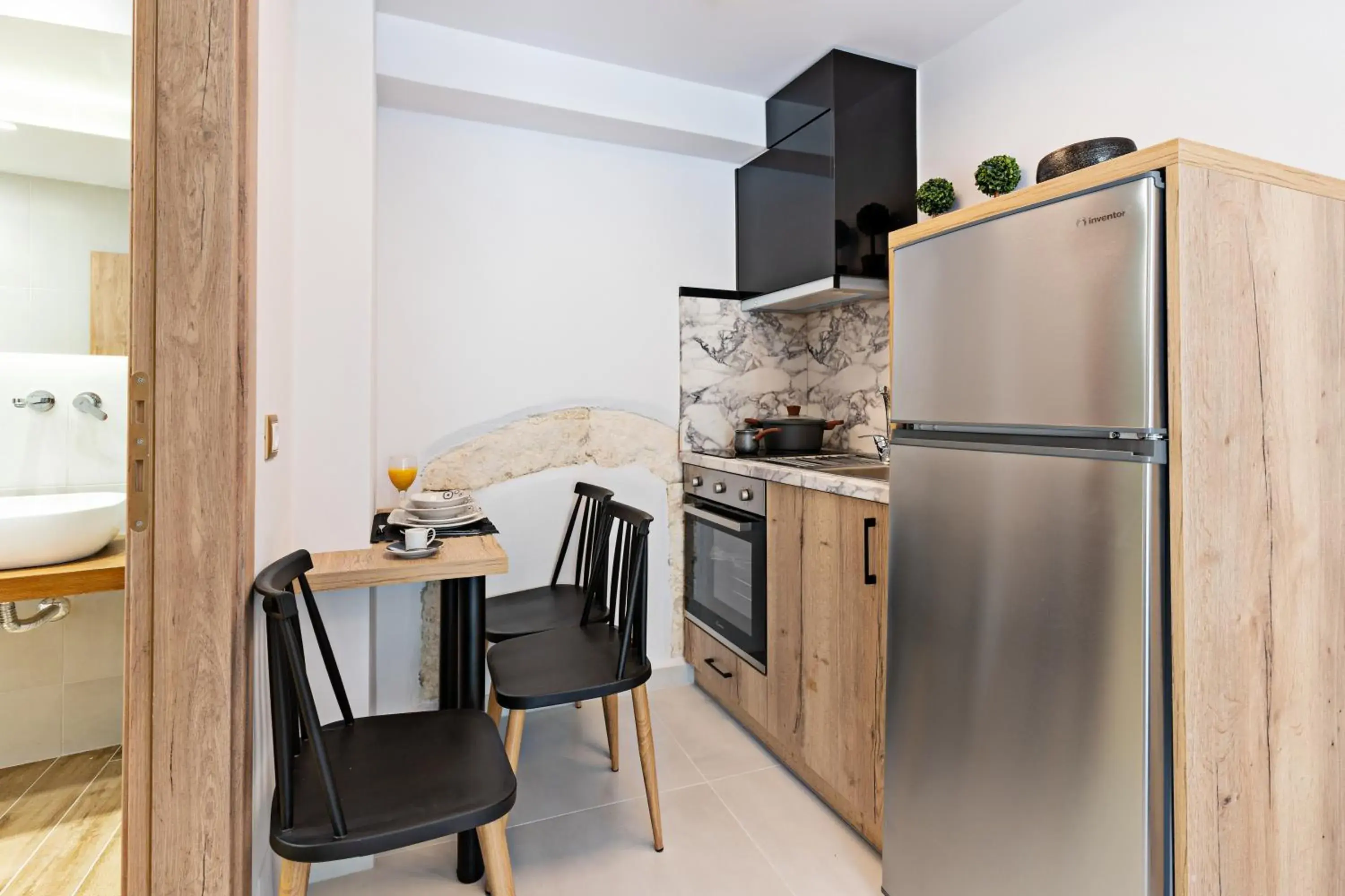 Kitchen or kitchenette in Erotokritos City Luxury Suites Kitchen or kitchenette in Erotokritos City Luxury Suites