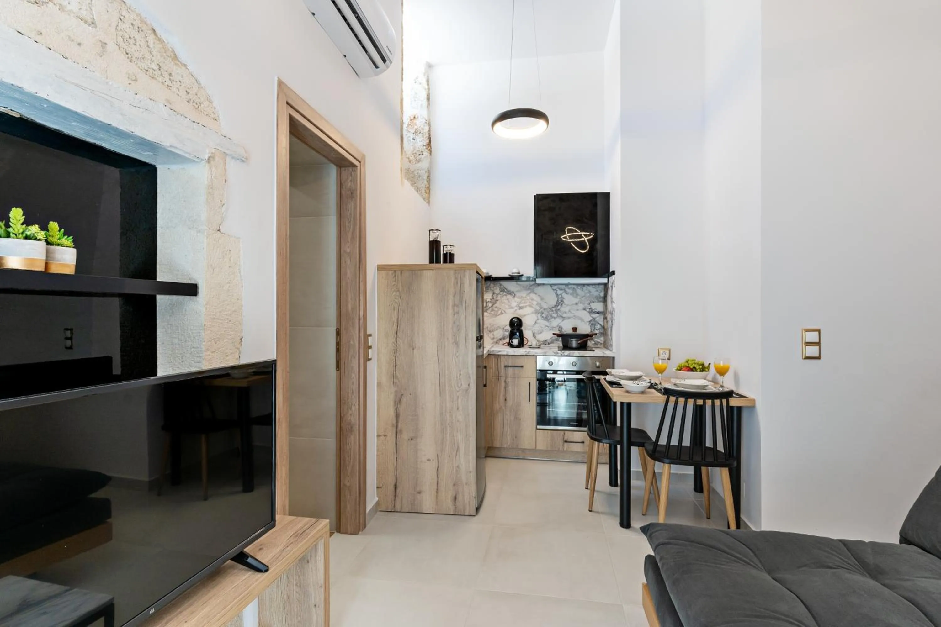 Kitchen or kitchenette in Erotokritos City Luxury Suites