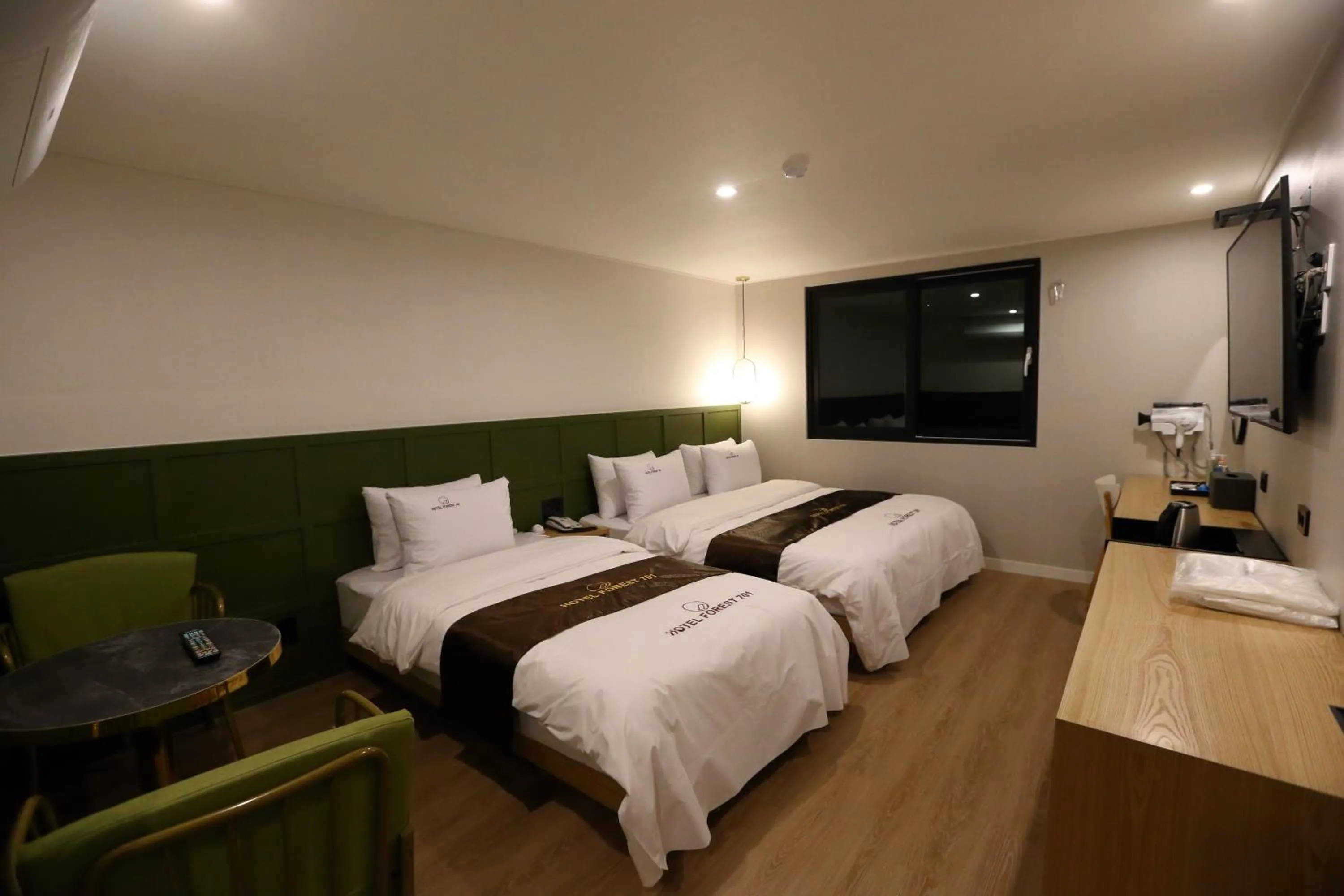 Bed in Forest 701 Hotel