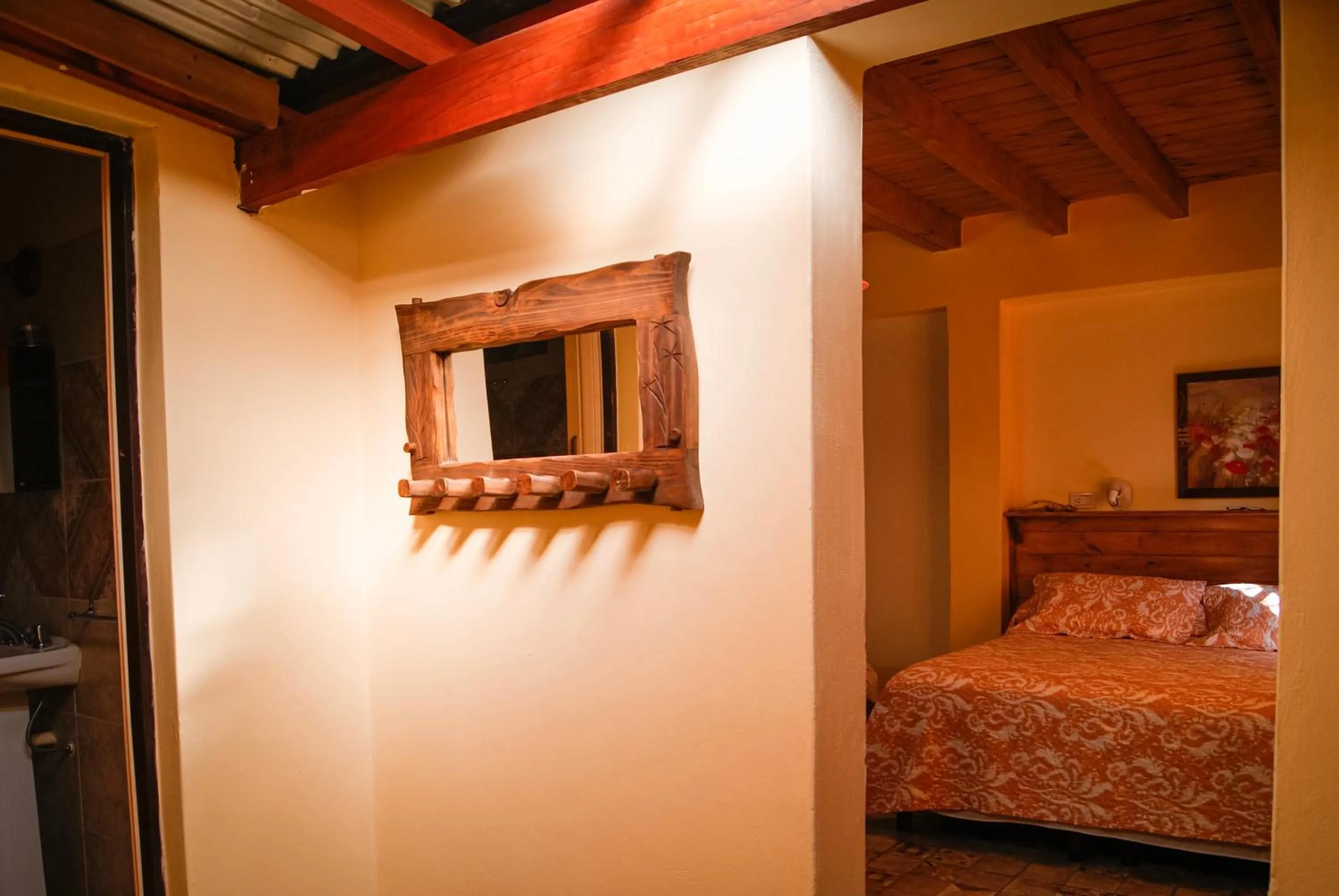 Living room, Bed in Hospedaje Flores del Sur