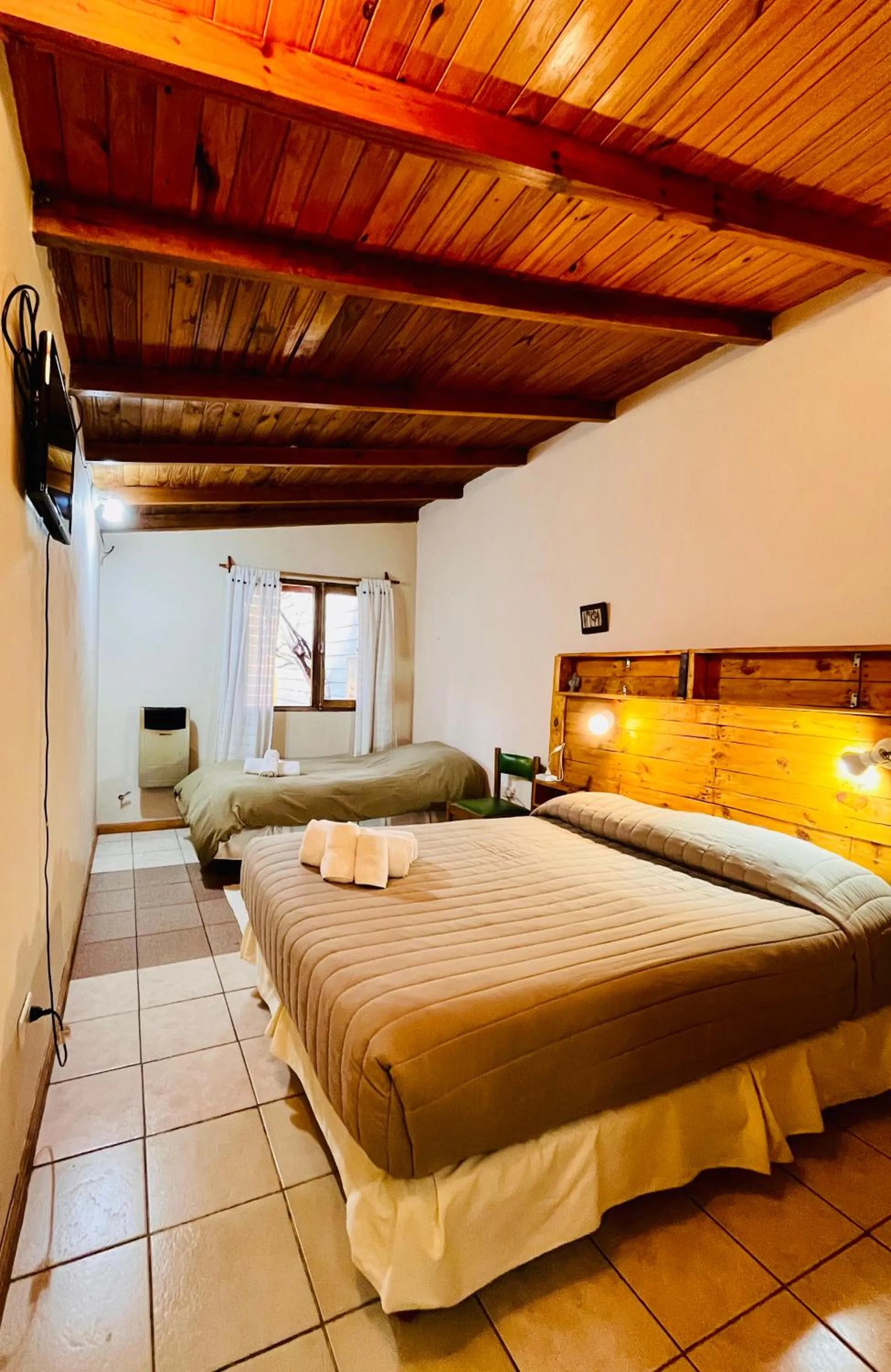 Photo of the whole room, Bed in Hospedaje Flores del Sur