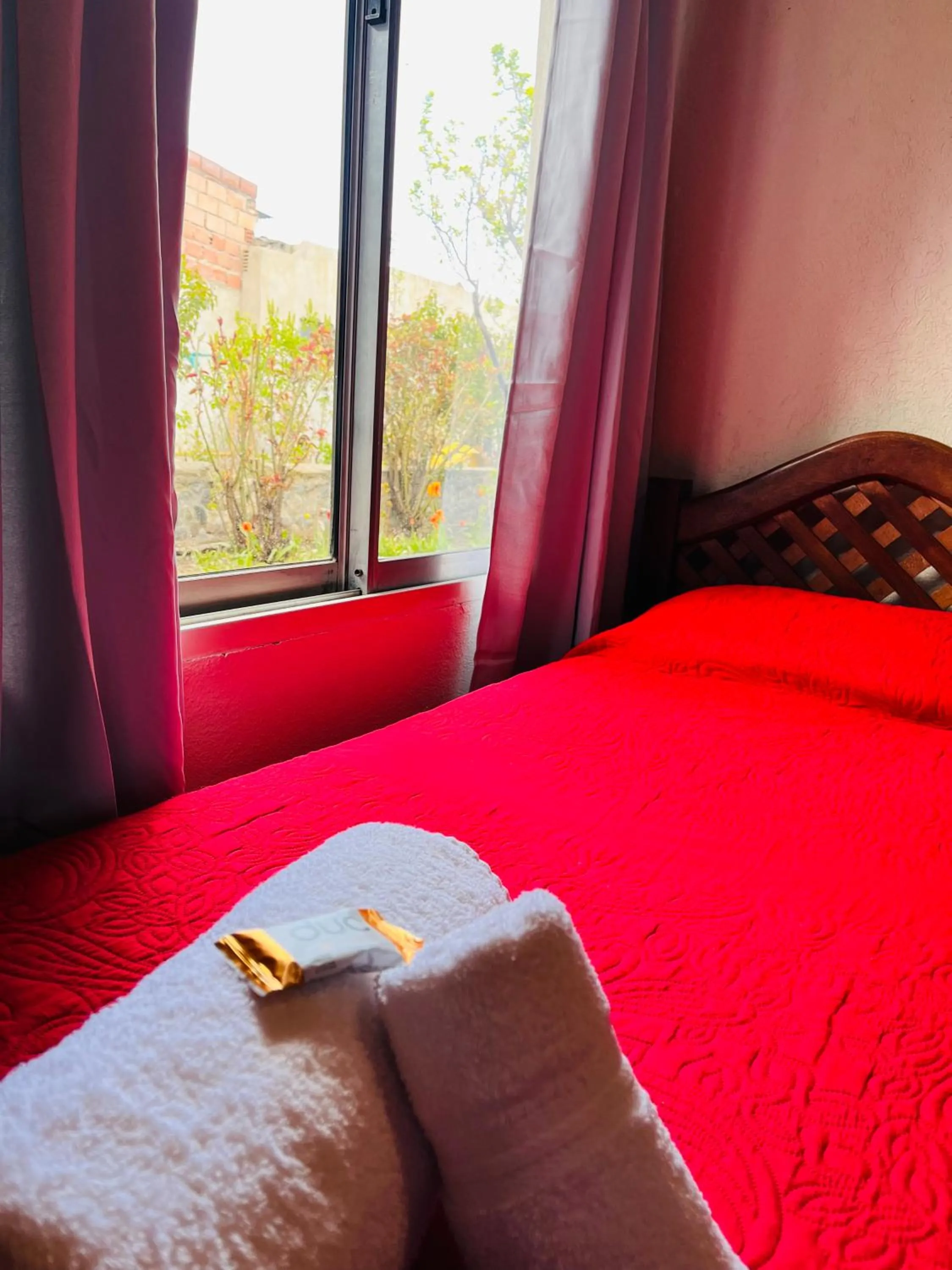 Bed in Hospedaje Flores del Sur