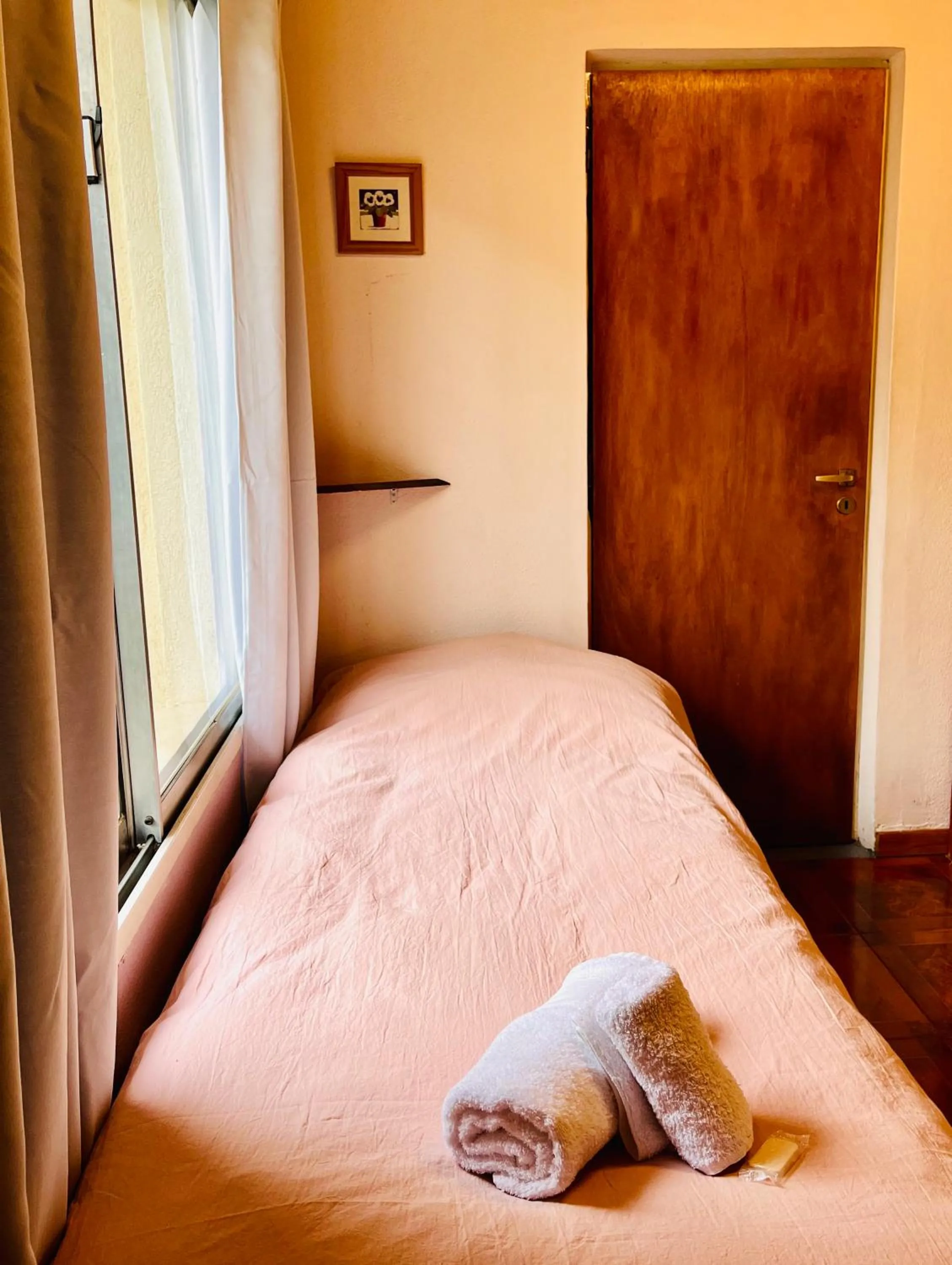 Bed in Hospedaje Flores del Sur