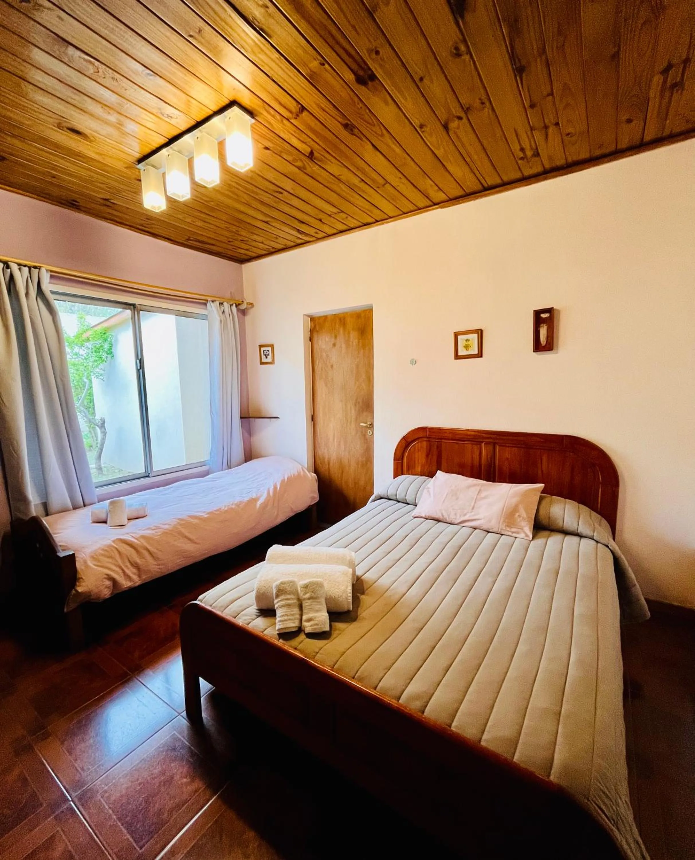 Photo of the whole room, Bed in Hospedaje Flores del Sur