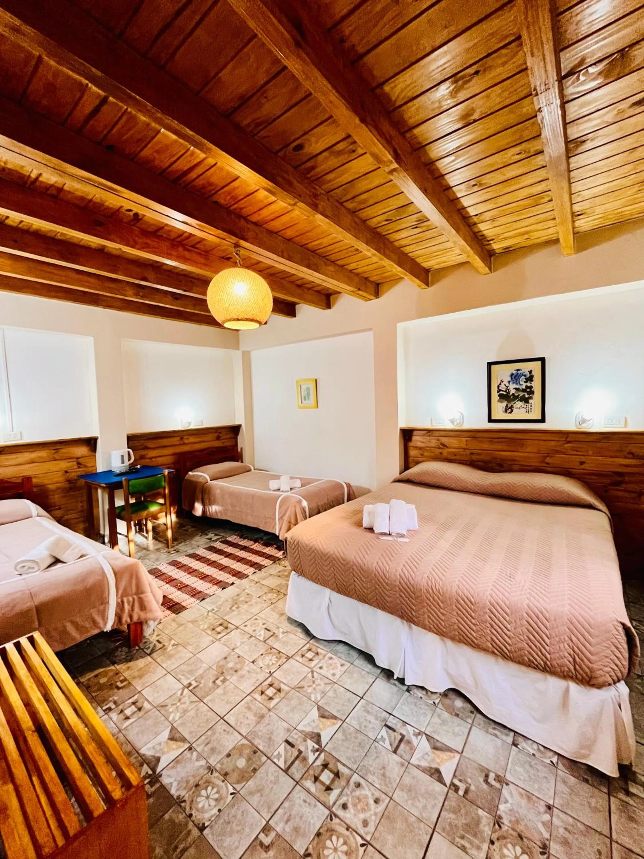 Photo of the whole room, Bed in Hospedaje Flores del Sur