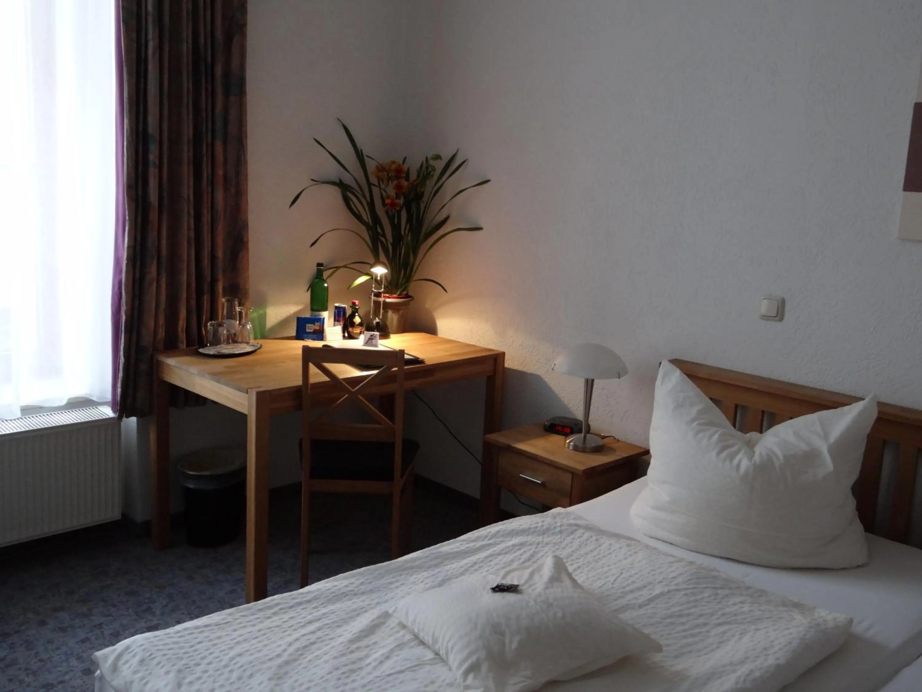 Bed in Hotel Meridian