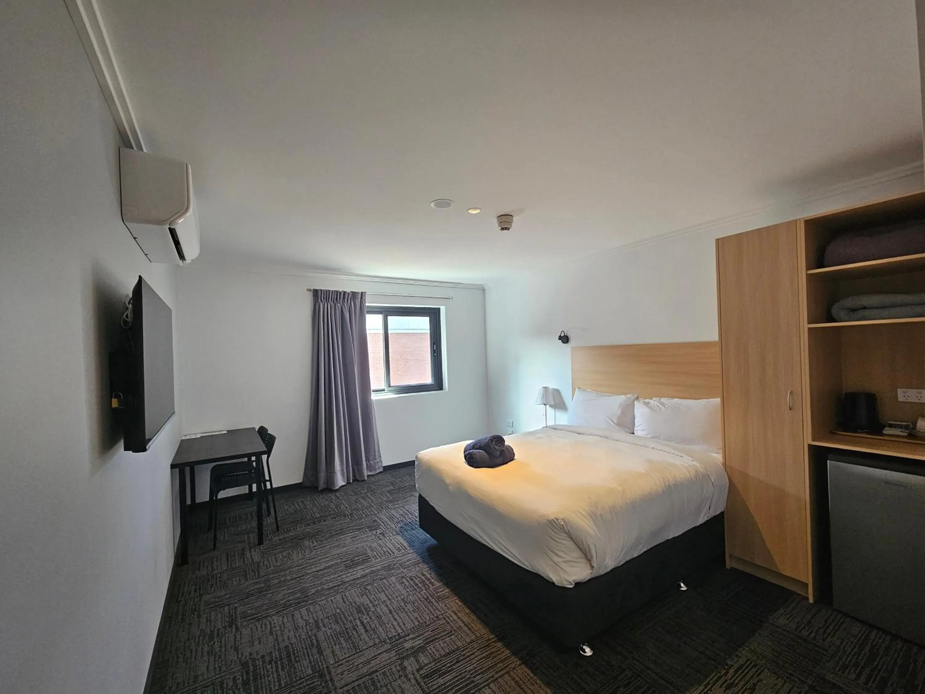 Bed in Econo Lodge Rivervale