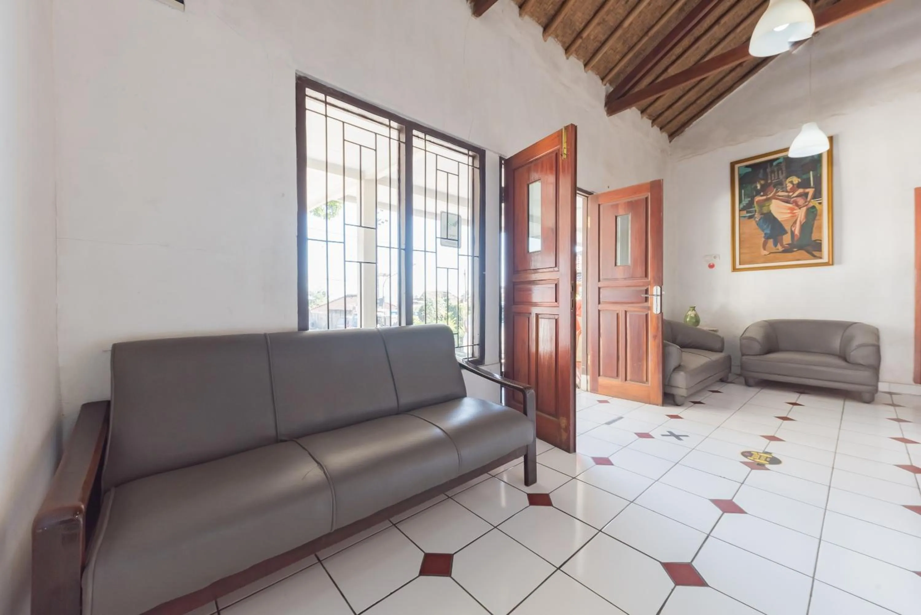 Seating area in RedDoorz Syariah @ Jl Raya Sukabumi