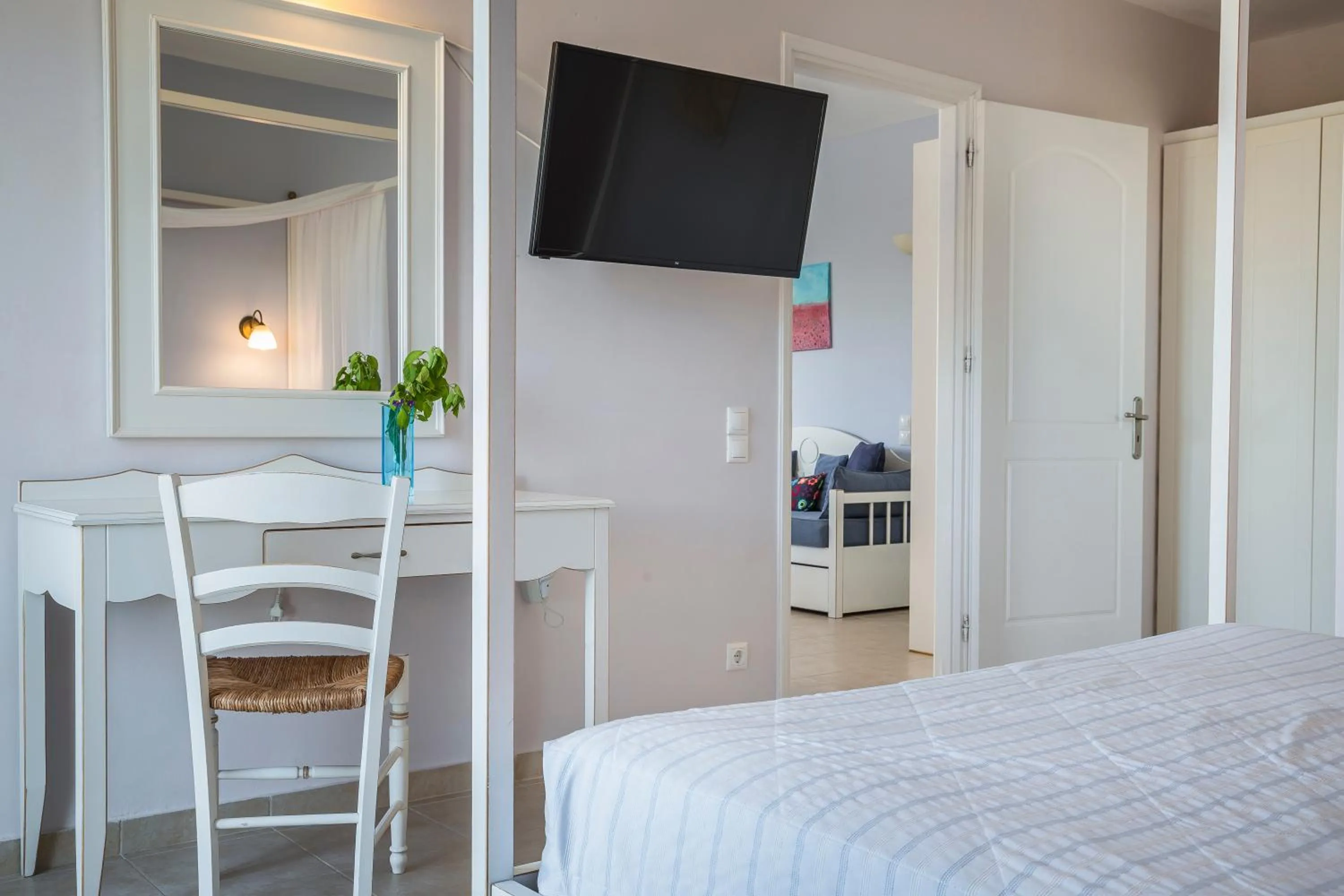 Bed in ASTRA Village Resort