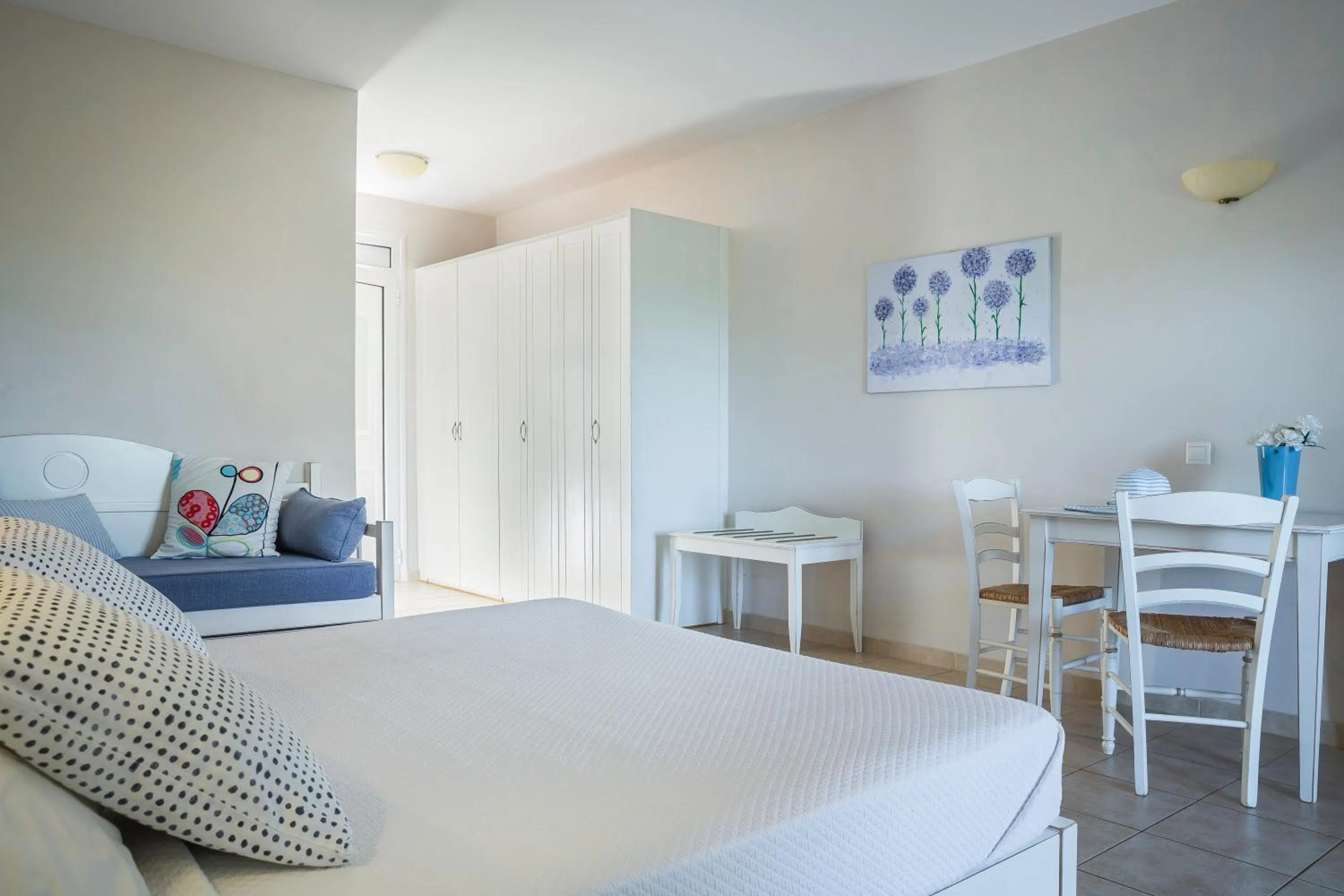 Kitchen or kitchenette, Bed in ASTRA Village Resort