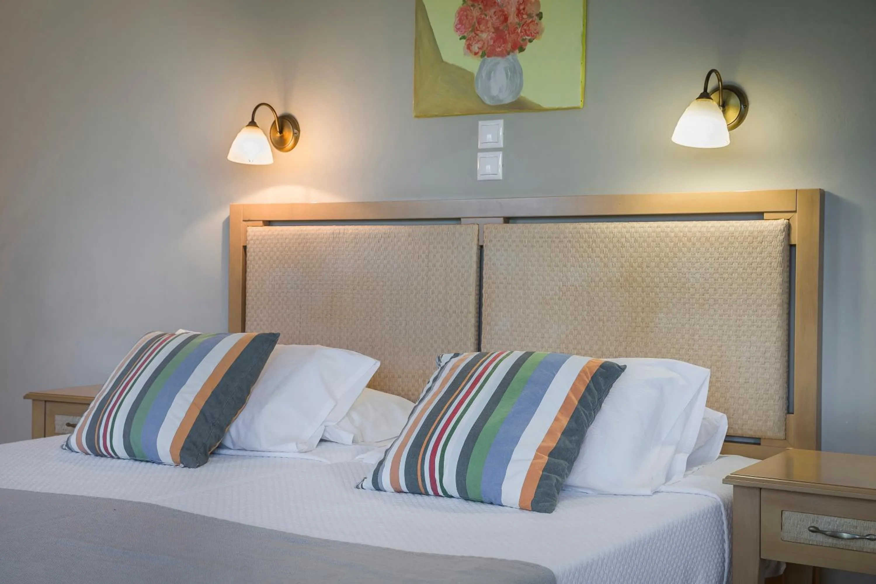 Bed in ASTRA Village Resort