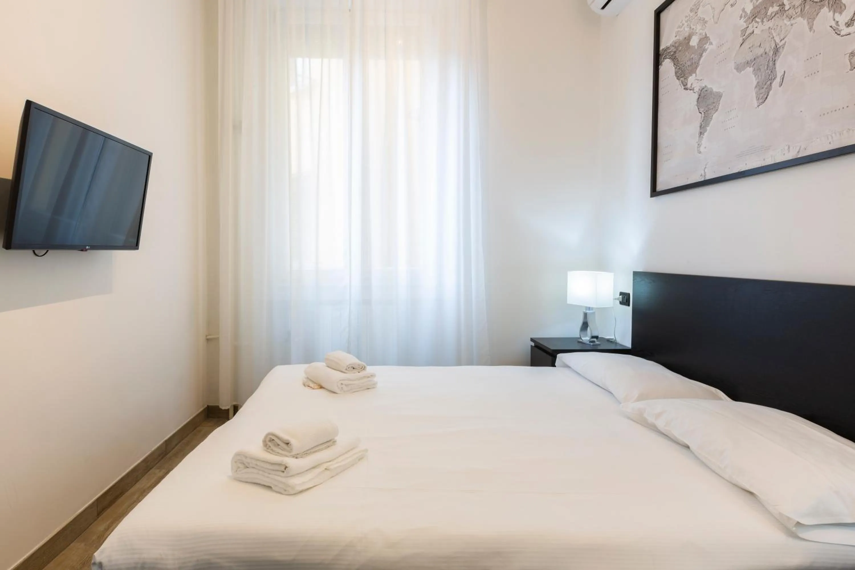 Bed in Yellow Line Apartment