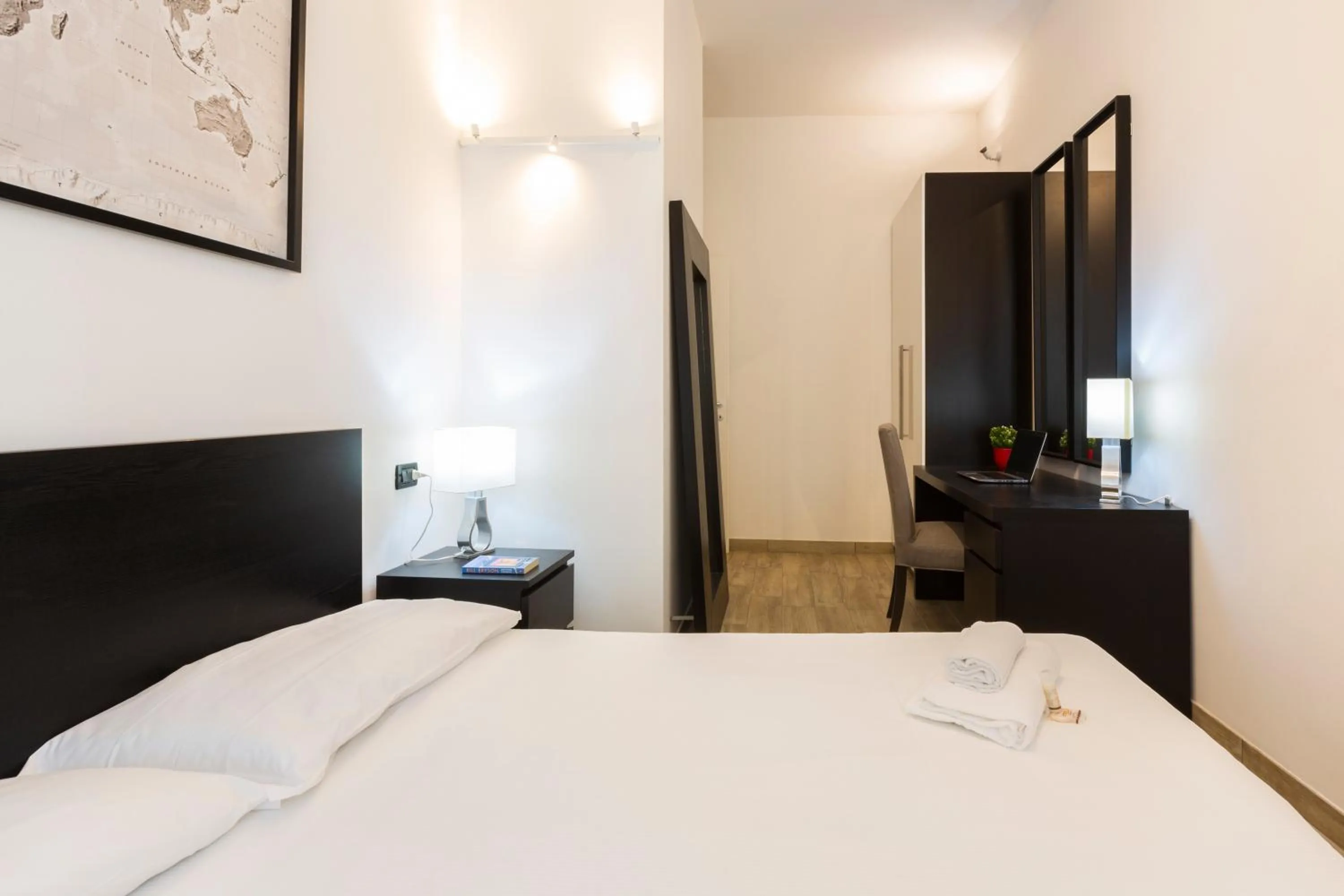 Bed in Yellow Line Apartment