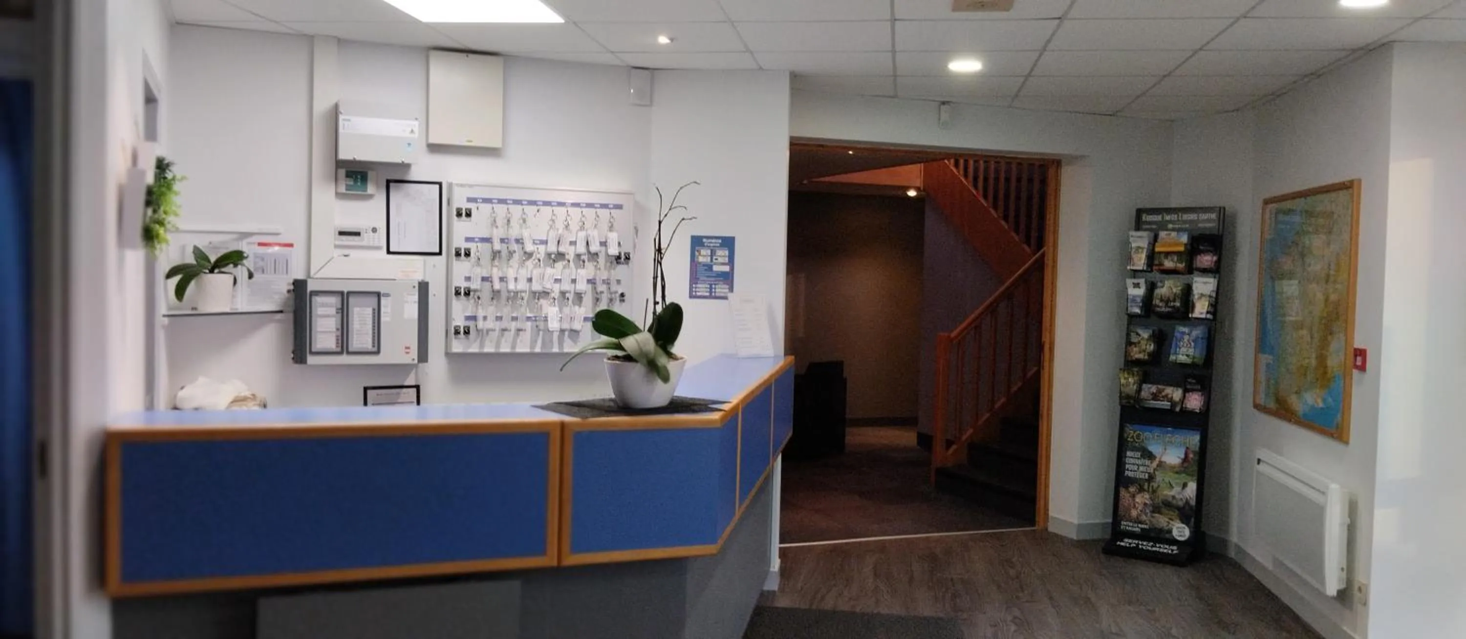 Lobby or reception in initial by balladins Sable sur Sarthe