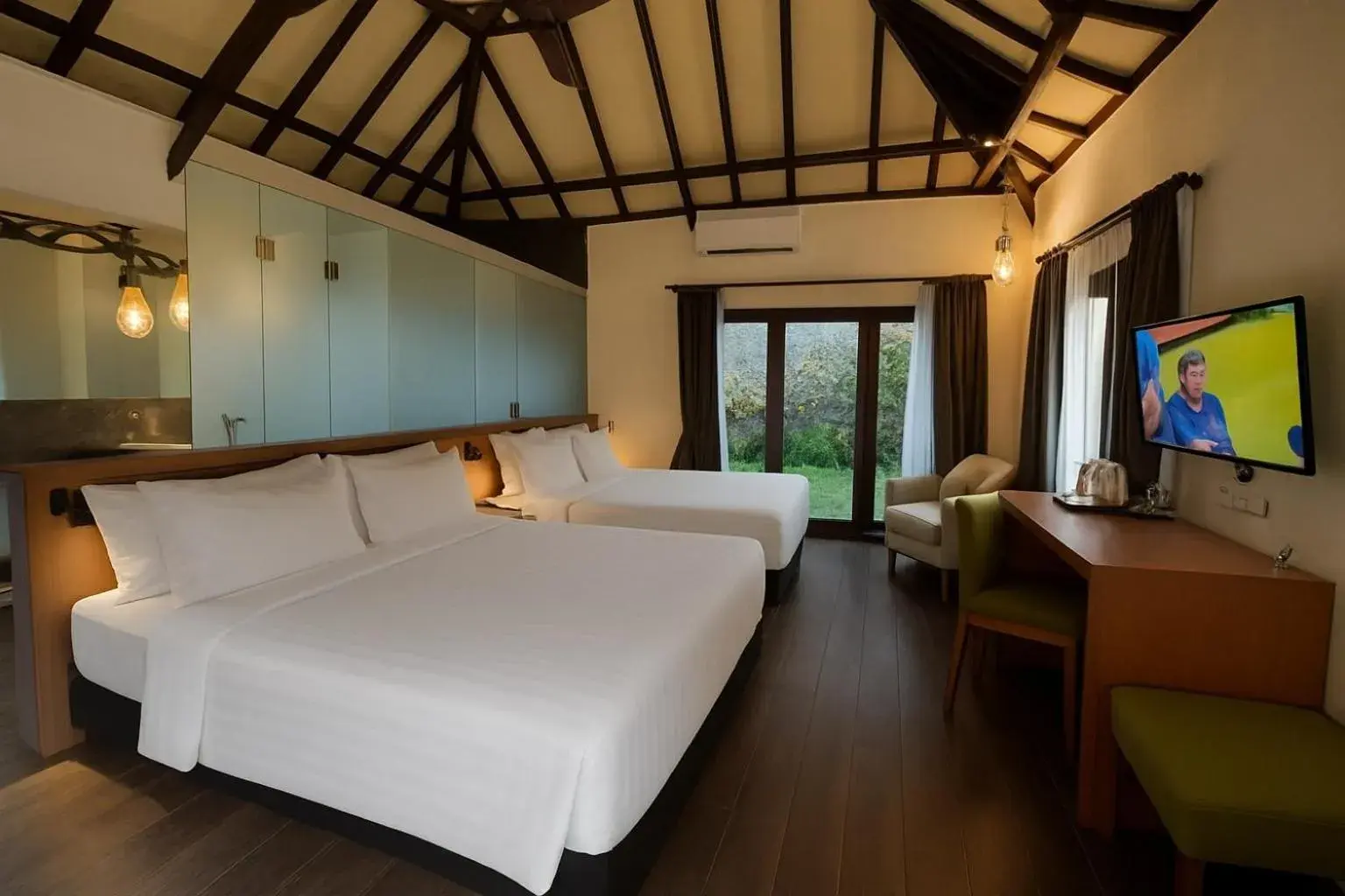 Communal lounge/ TV room, Bed in The Batu Hotel & Villas Communal lounge/ TV room, Bed in The Batu Hotel & Villas