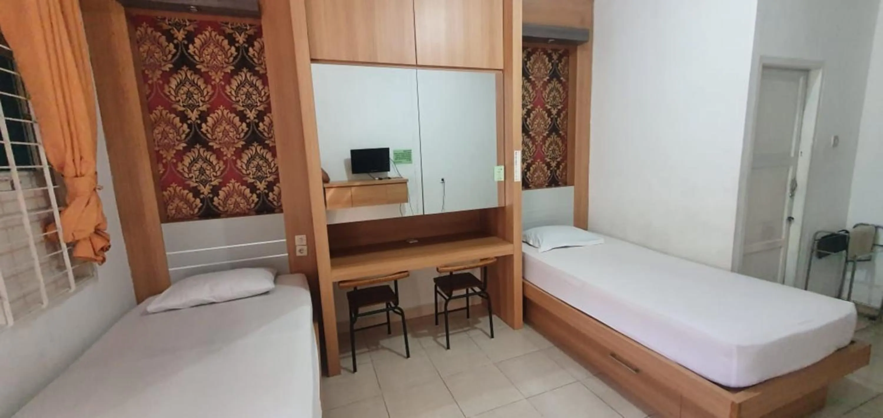 Photo of the whole room, Bed in Rumah Dempo Syariah