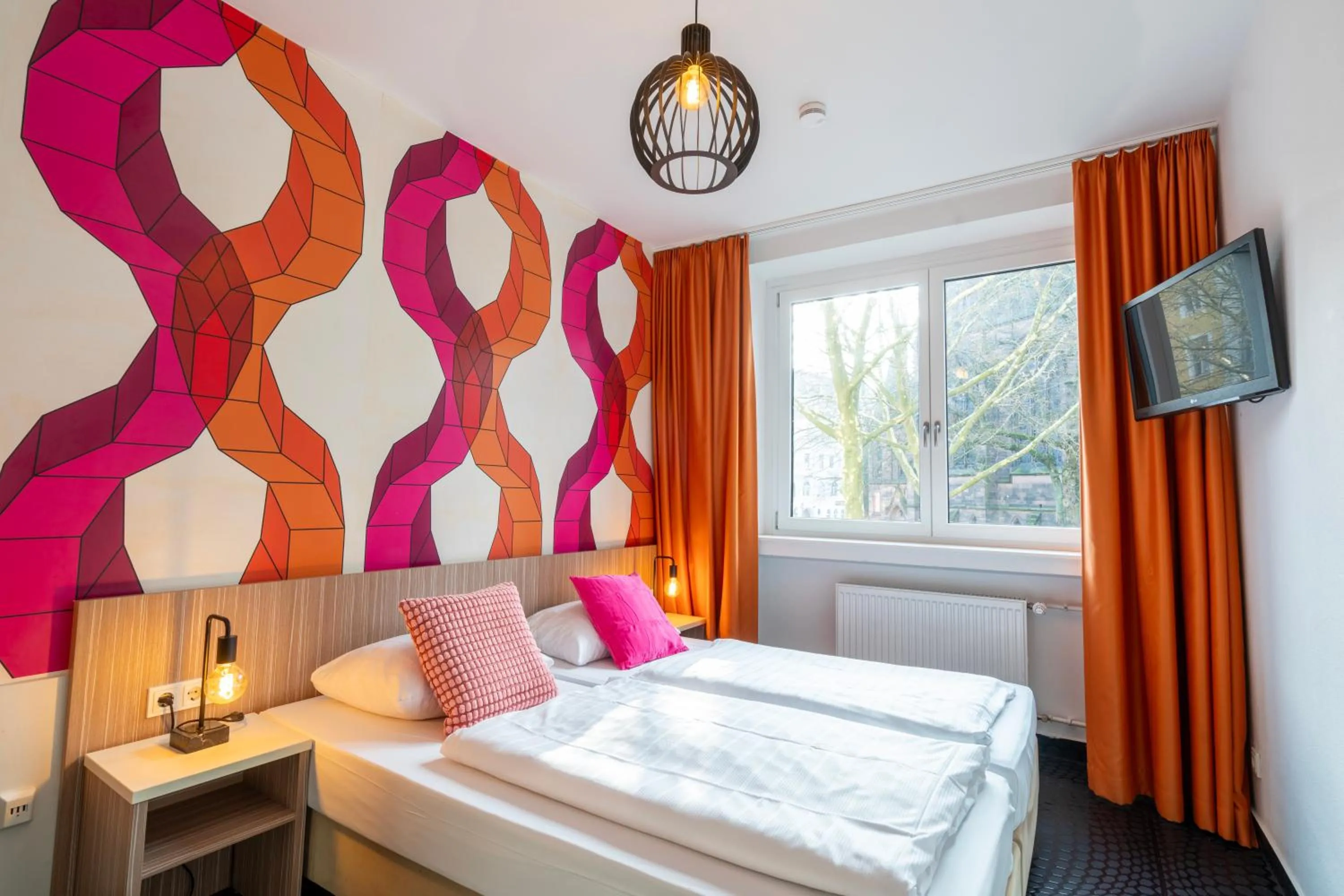 View (from property/room), Bed in Hotel Madeleine Biohotel