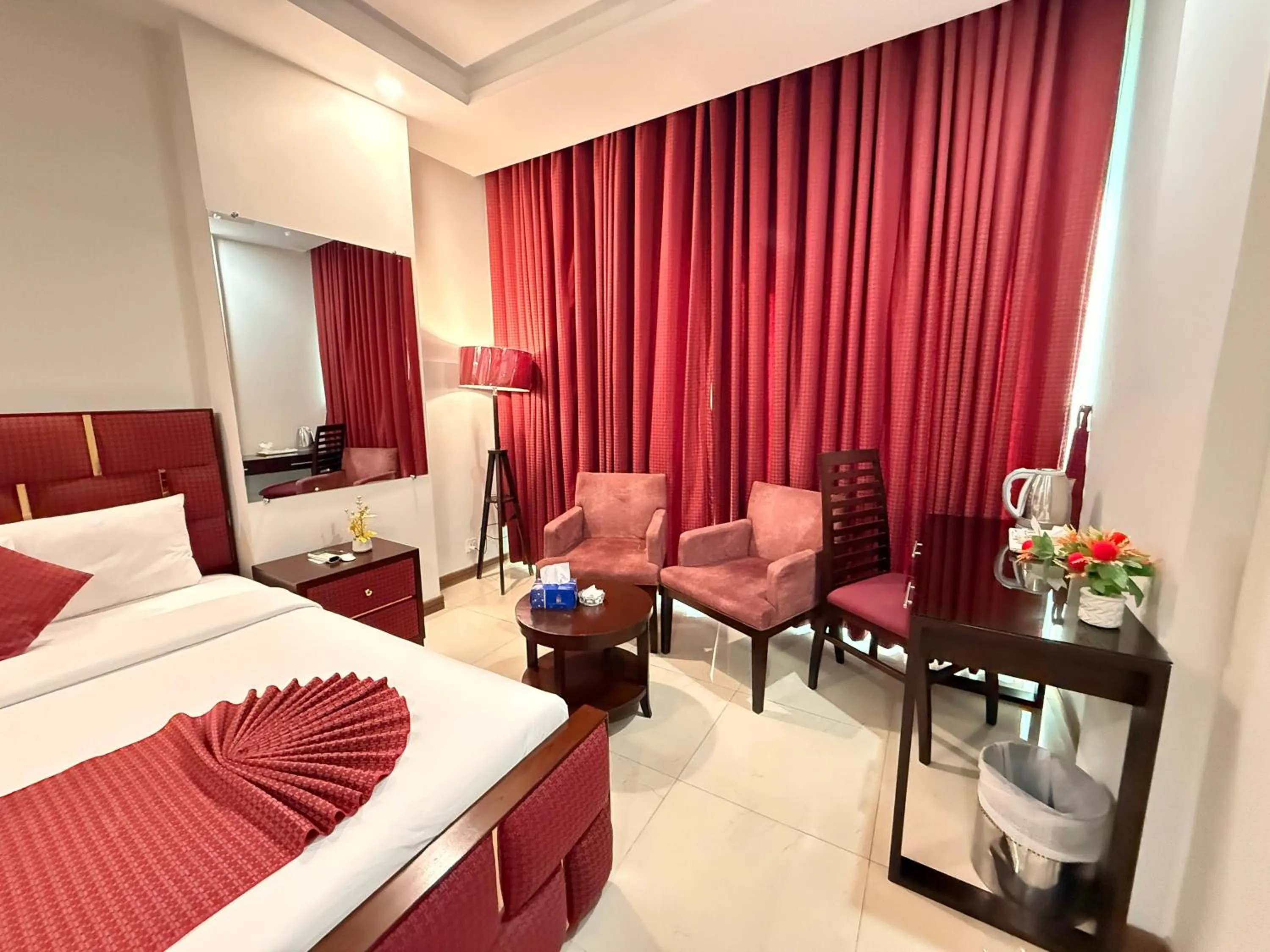 Bed in Atlas Hotel Islamabad