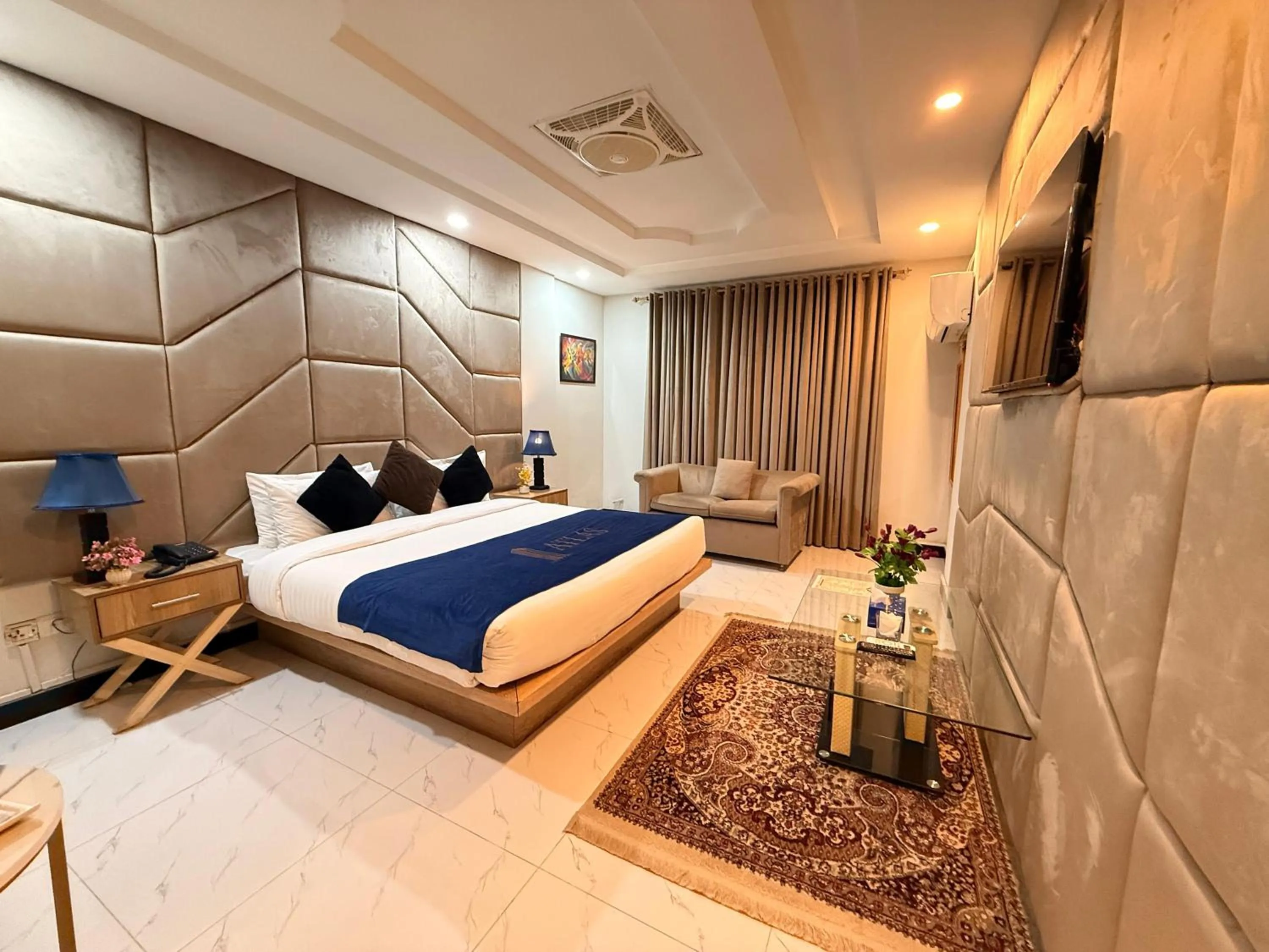 Bed in Atlas Hotel Islamabad