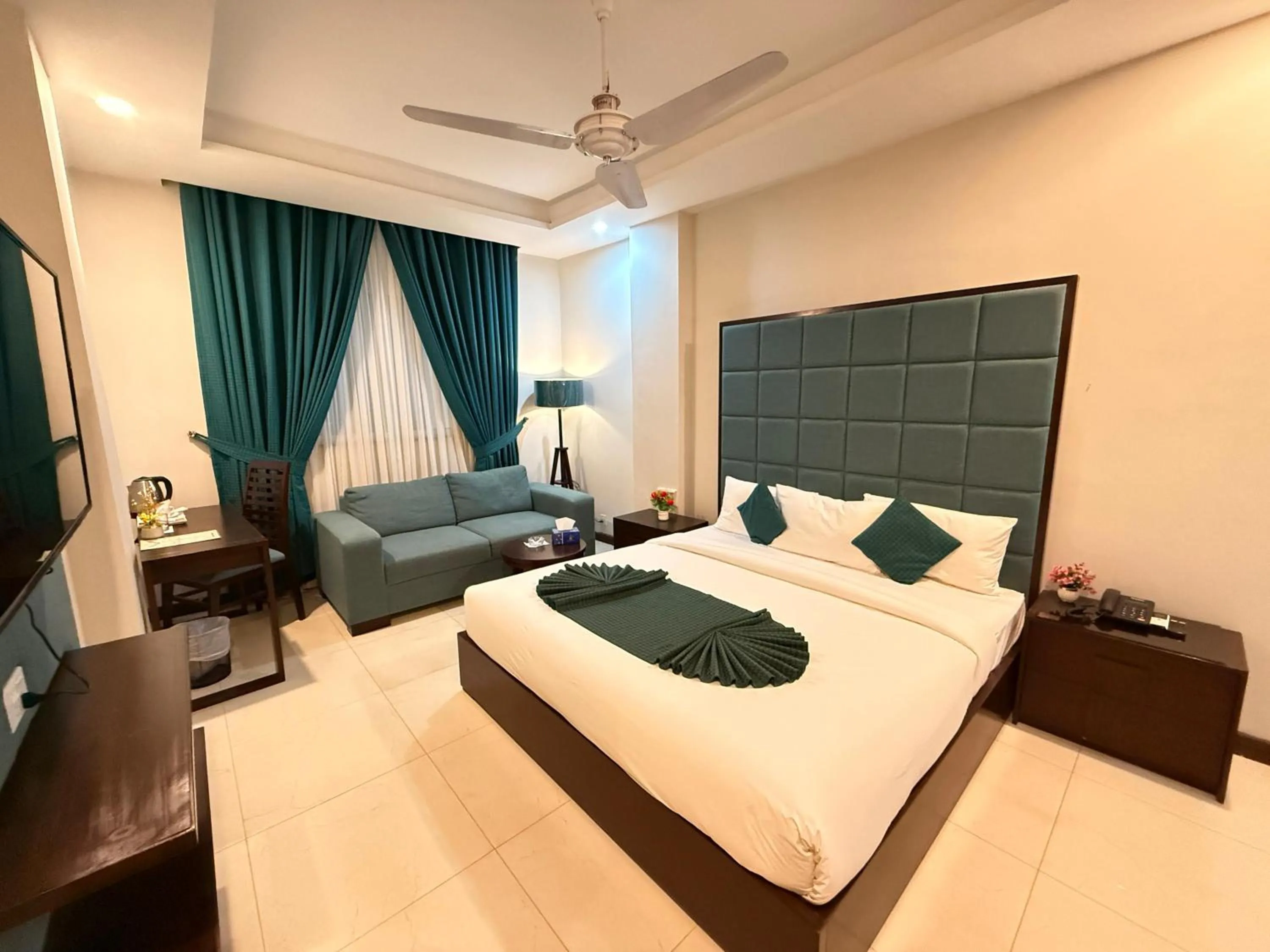 Bed in Atlas Hotel Islamabad