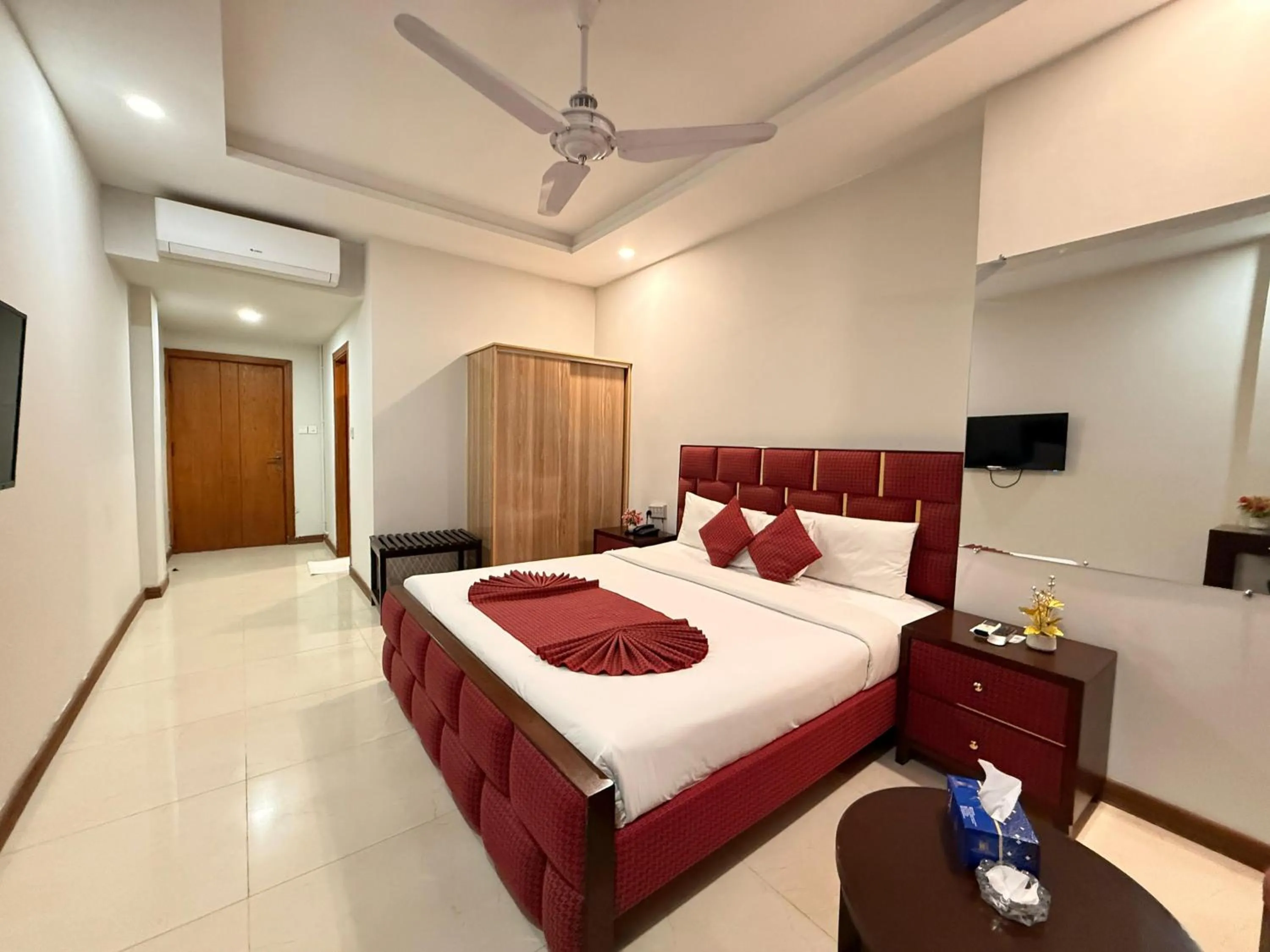 Bed in Atlas Hotel Islamabad