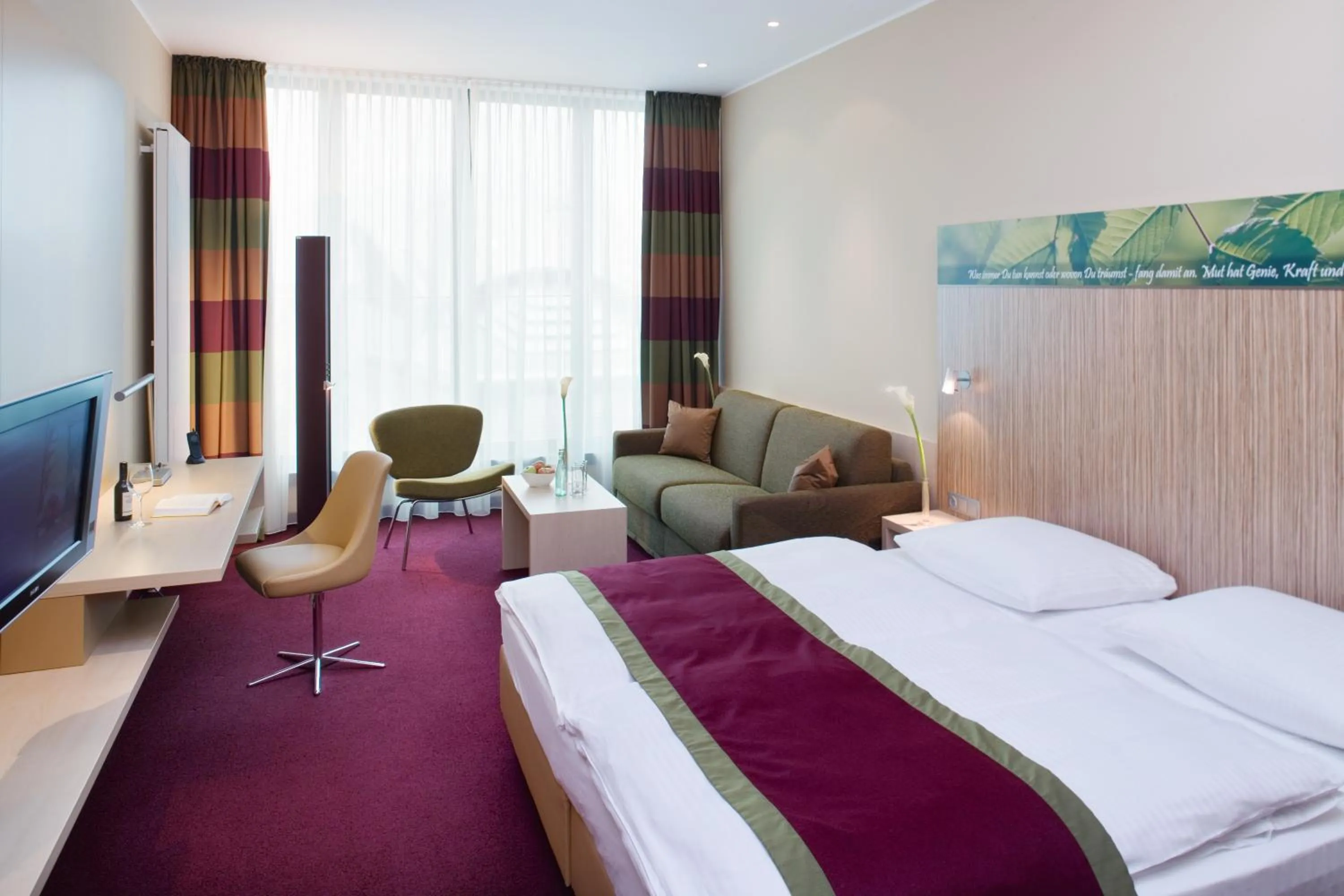 Photo of the whole room, Bed in Mövenpick Hotel Frankfurt City Messe