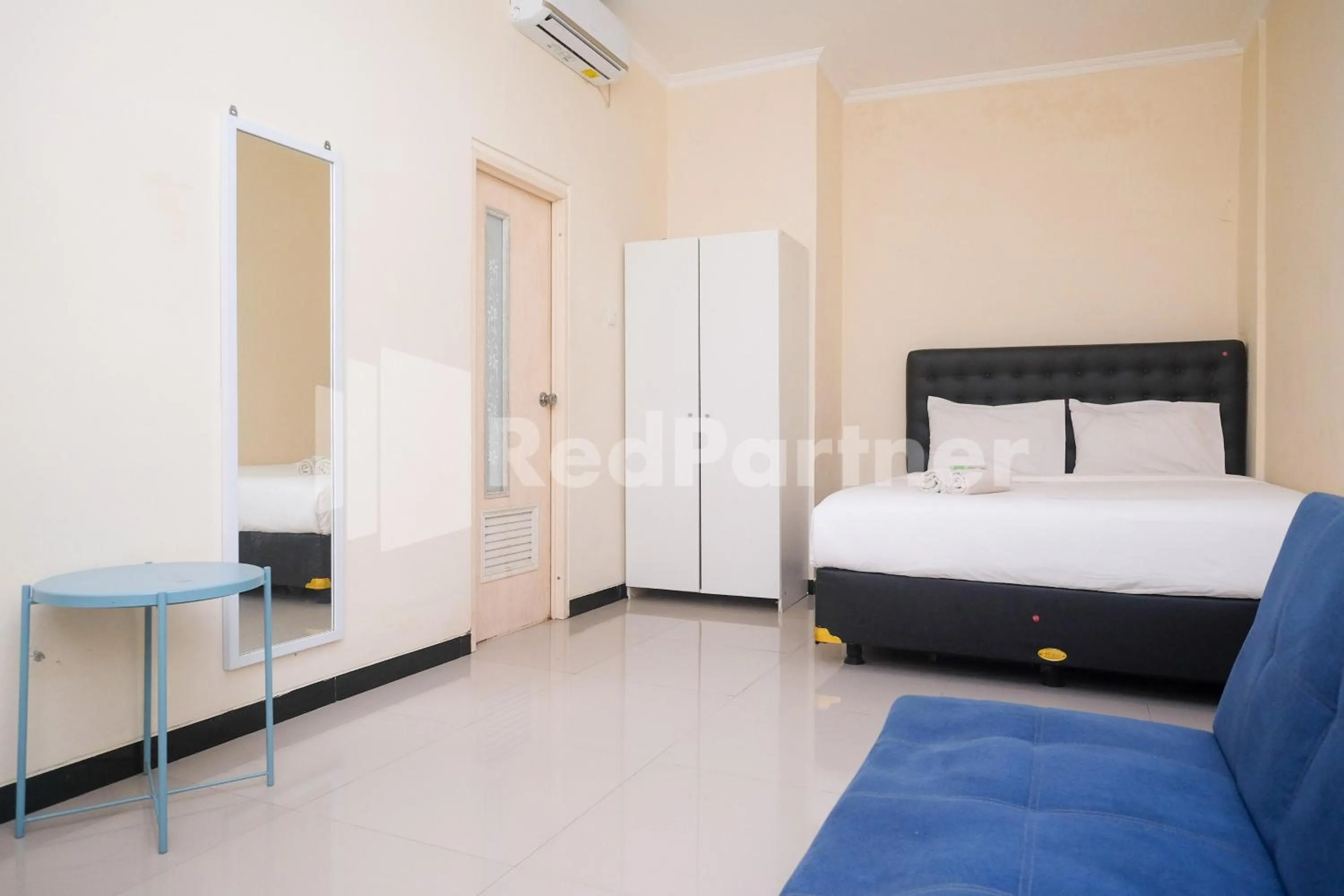 Bed in Griya Loka 2 Syariah Near Simpang Lima Mitra Reddoorz