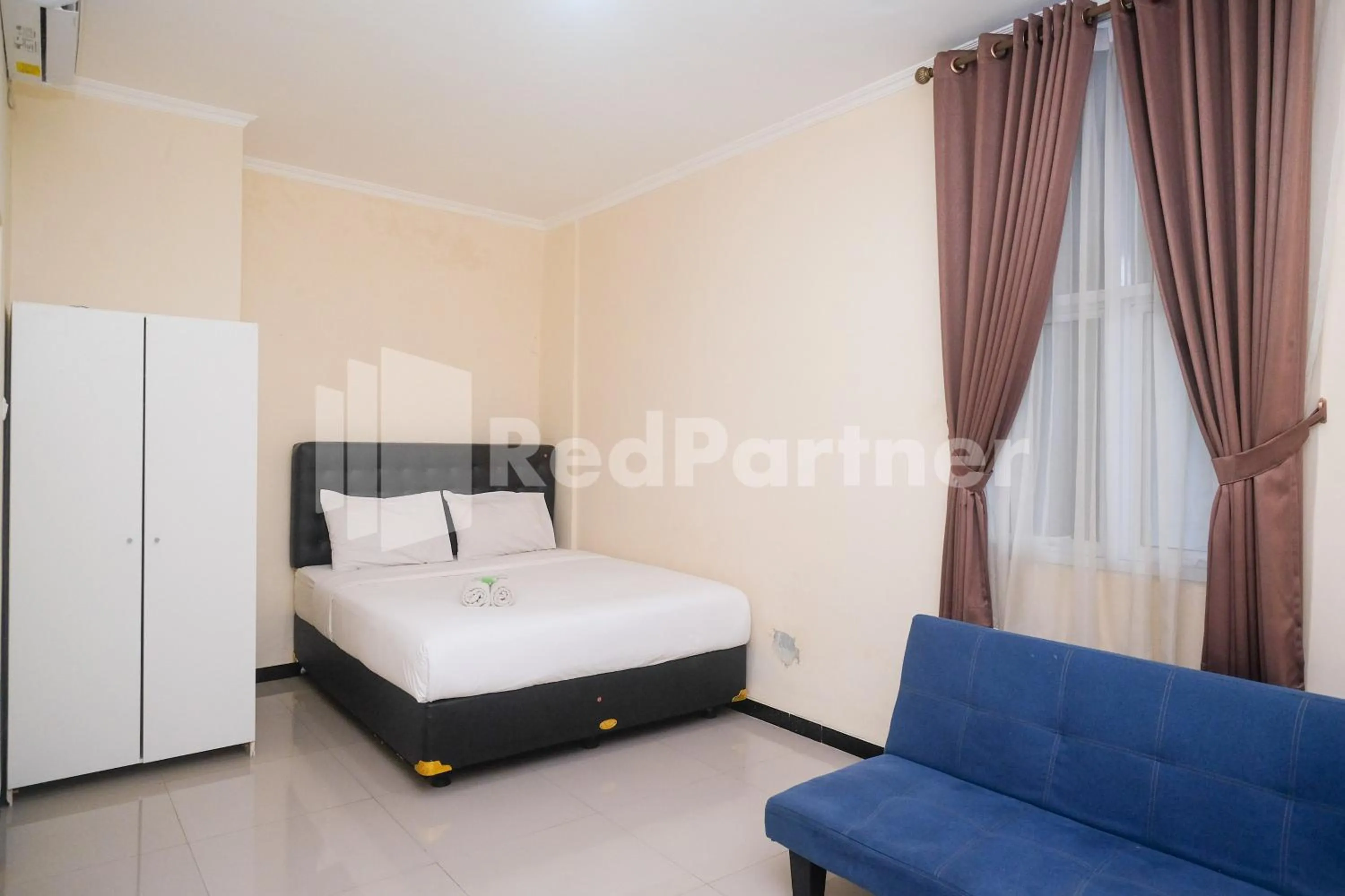 Bed in Griya Loka 2 Syariah Near Simpang Lima Mitra Reddoorz