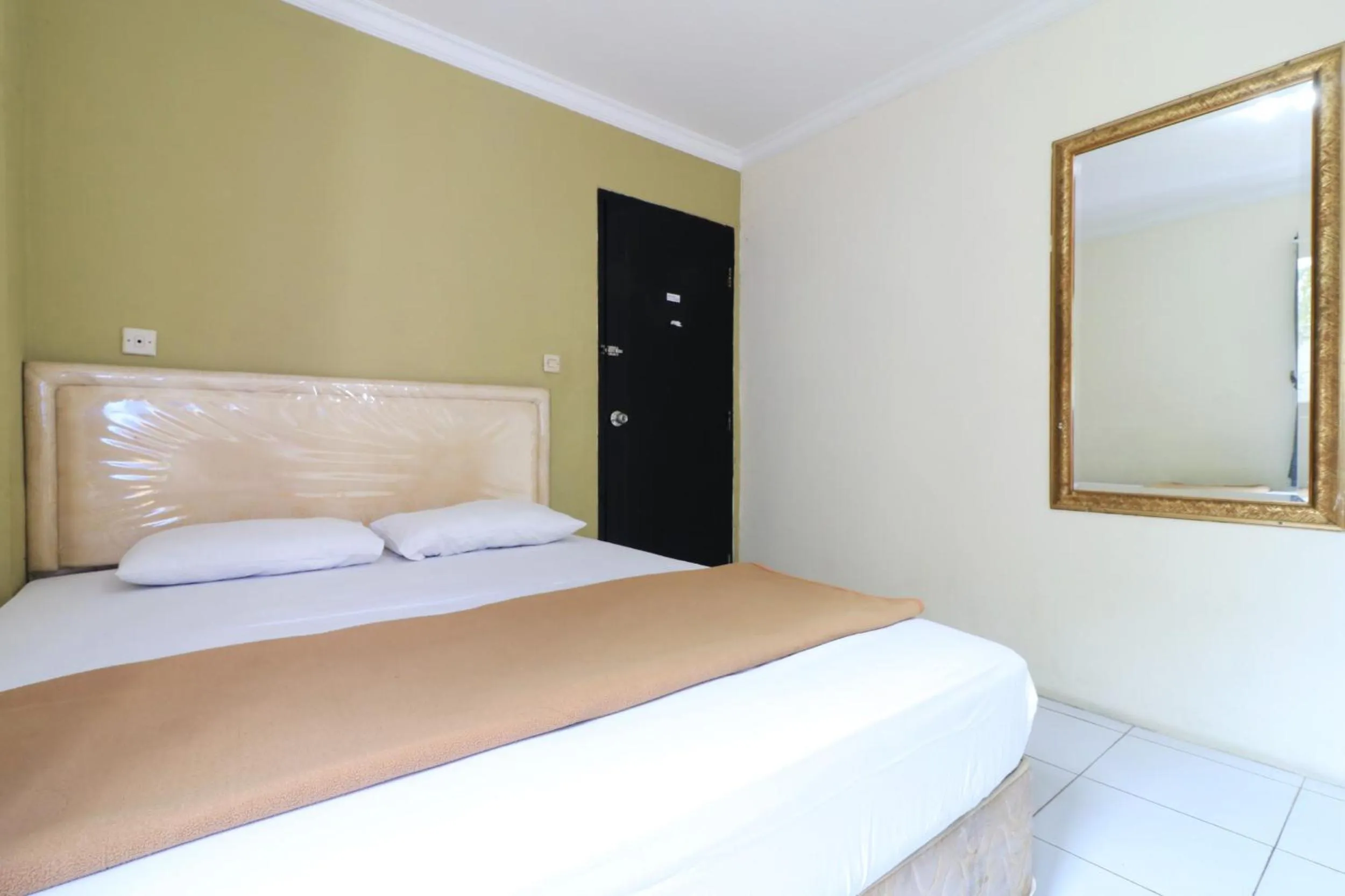 Bed in AMS Hotel Koja