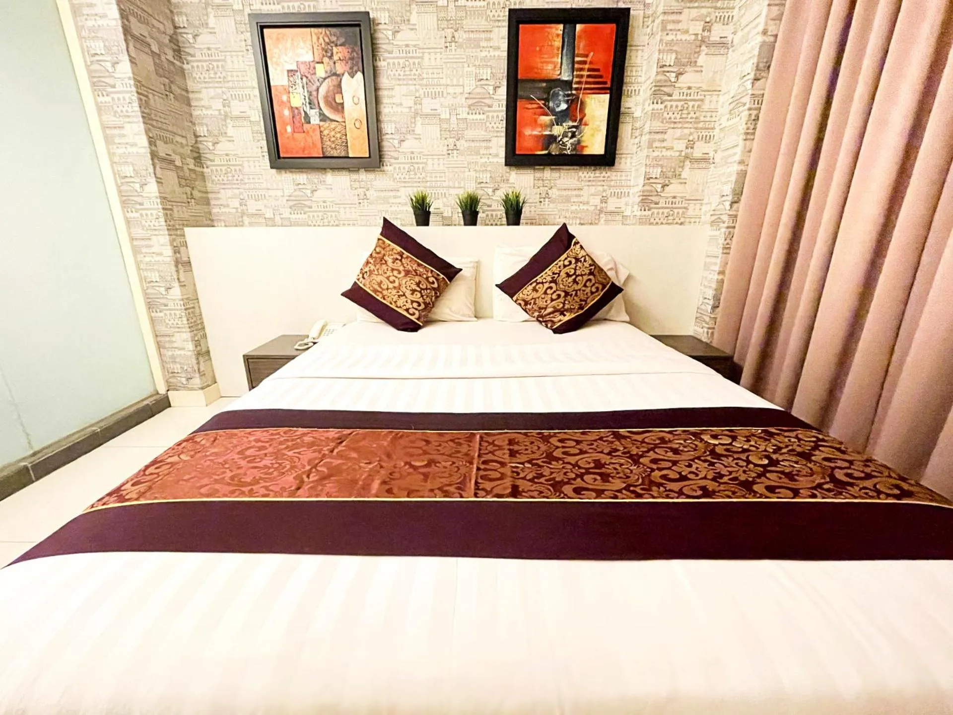 Bedroom in ESQ Shamelin Hotel