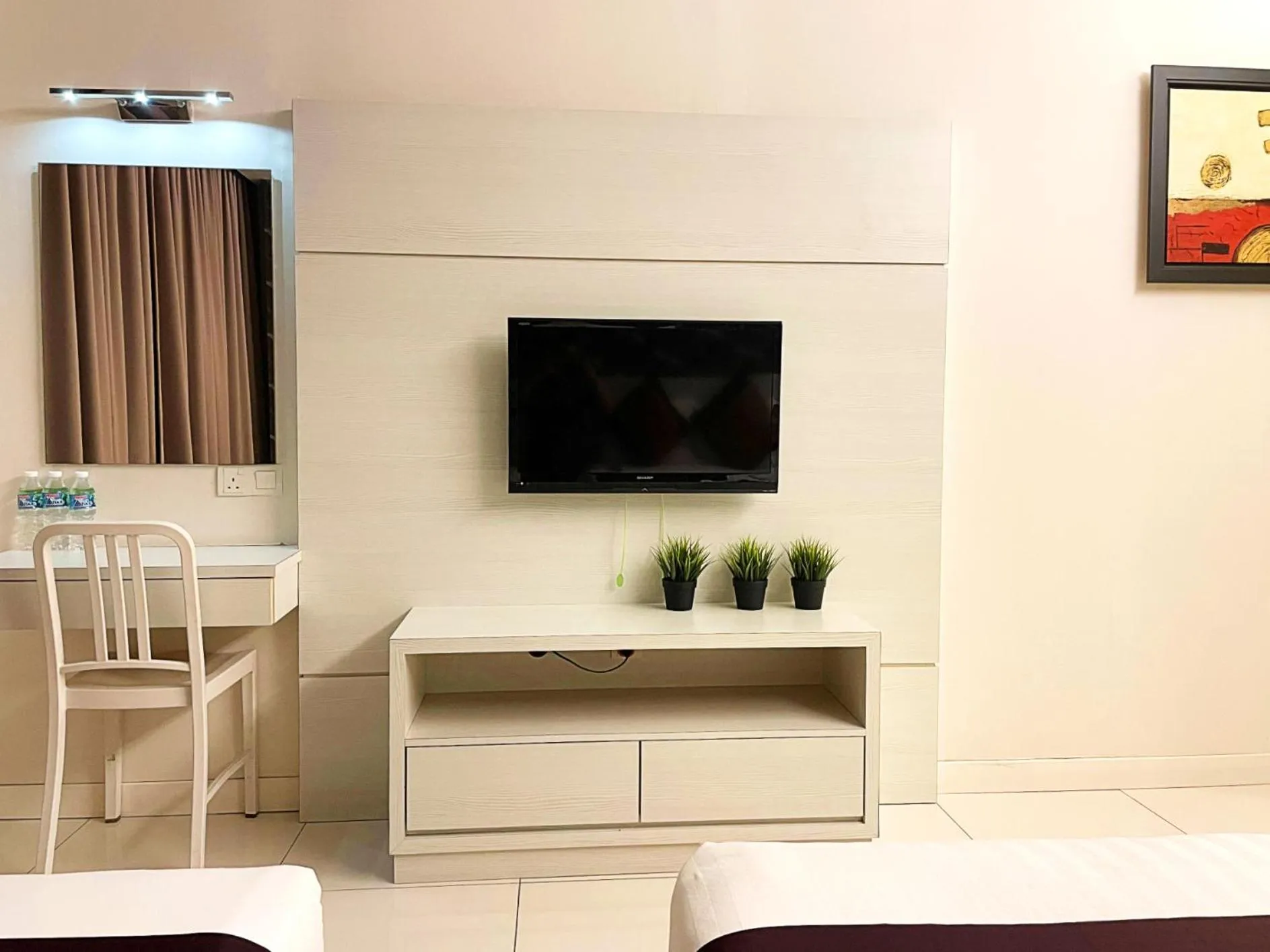 TV and multimedia, TV/Entertainment Center in ESQ Shamelin Hotel