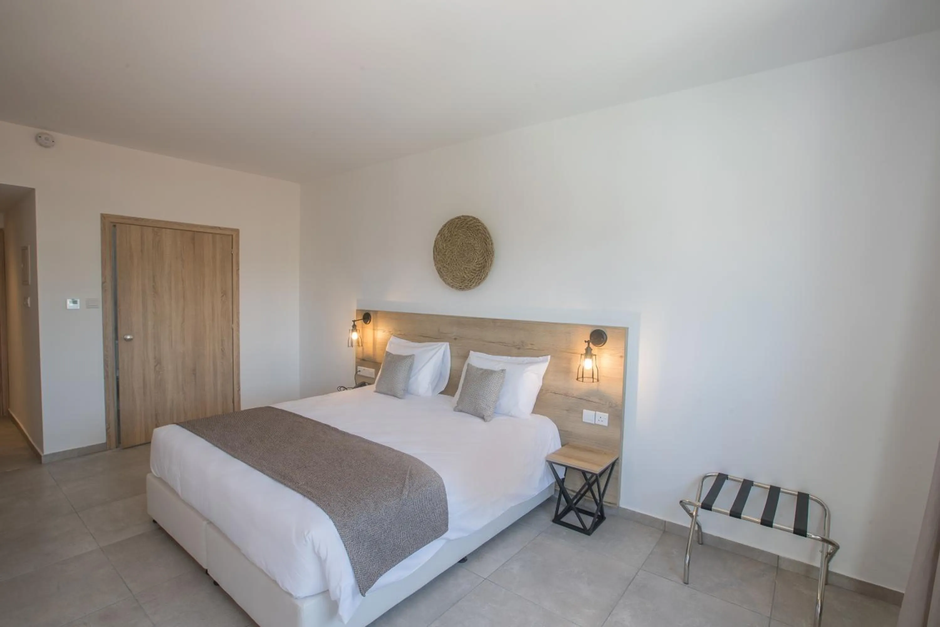 Bed in Bohemian Gardens Hotel