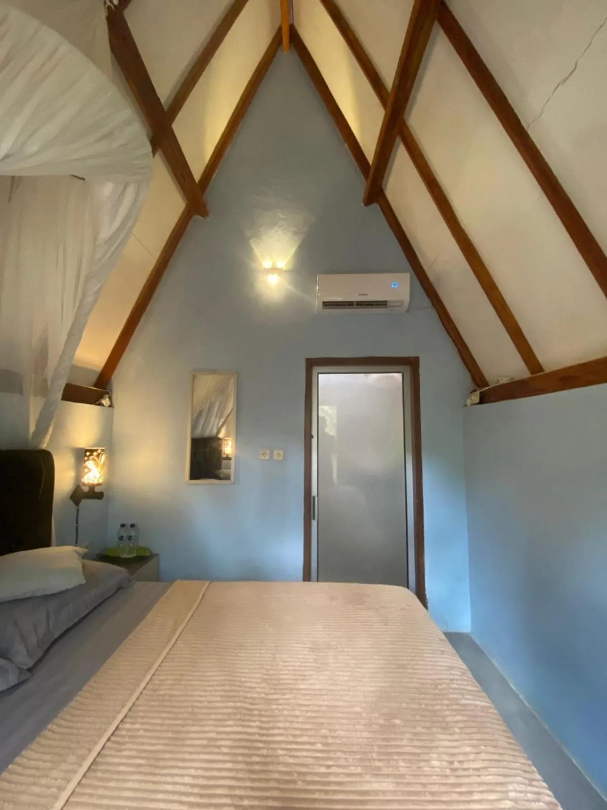 Bed in Bale Baleku Homestay