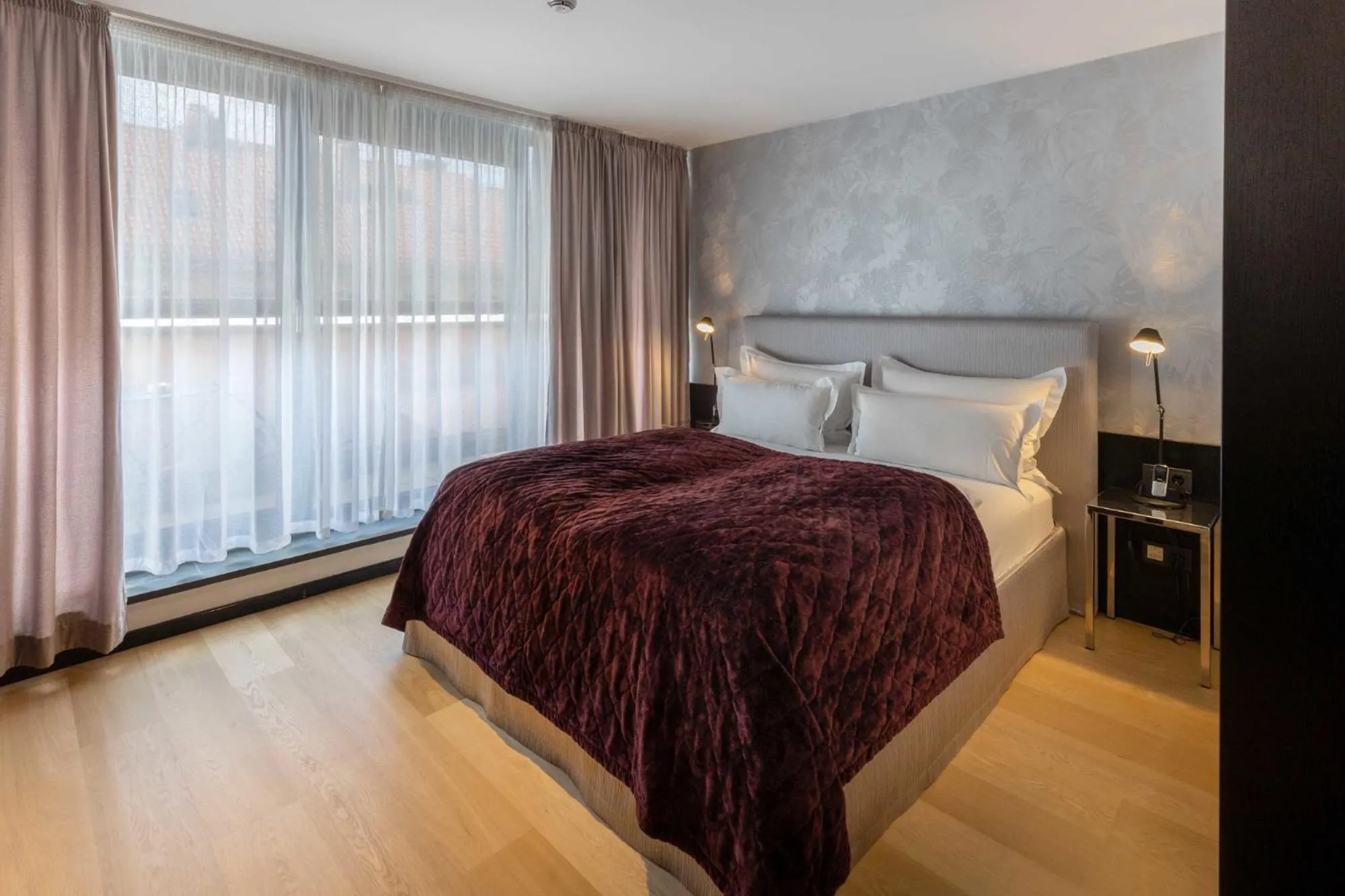 Bed in La Mansion Vi Vadi Hotel