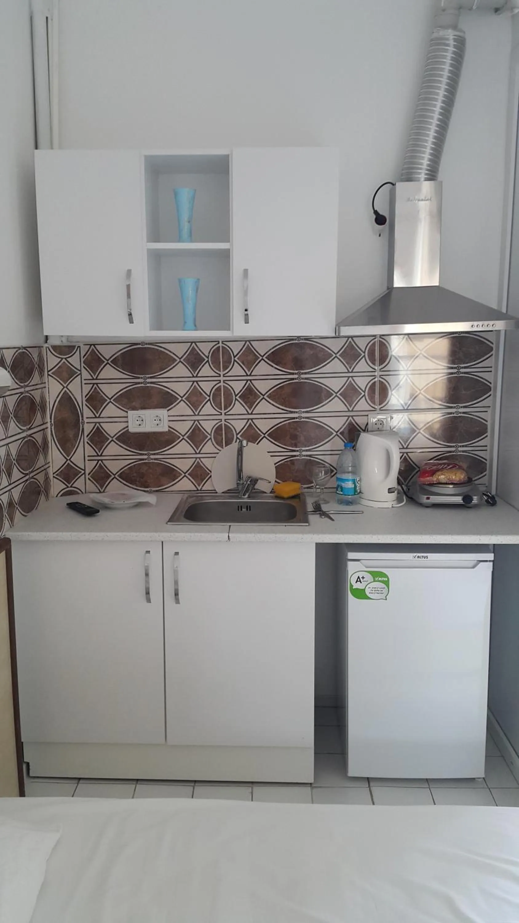 Kitchen or kitchenette in Delphin Hotel Side