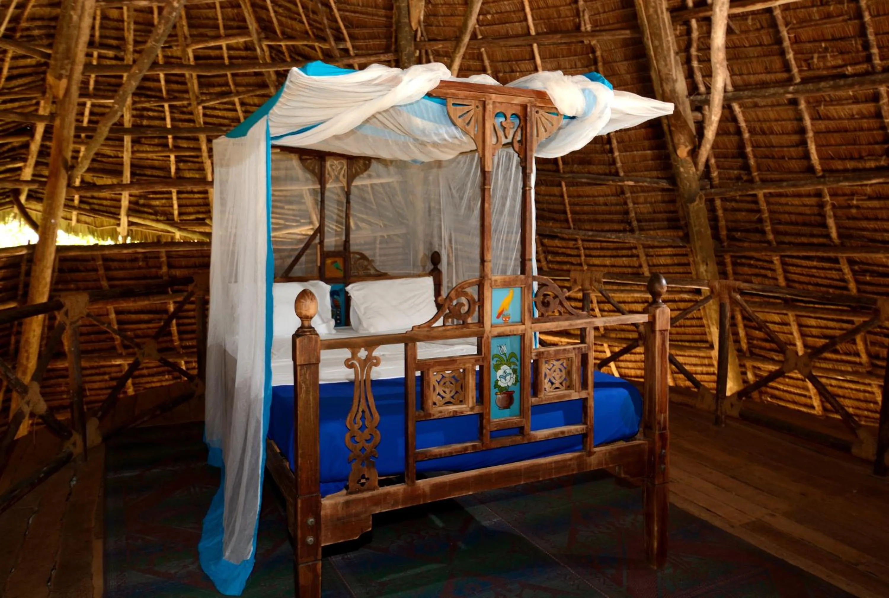 Bed in Unguja Lodge