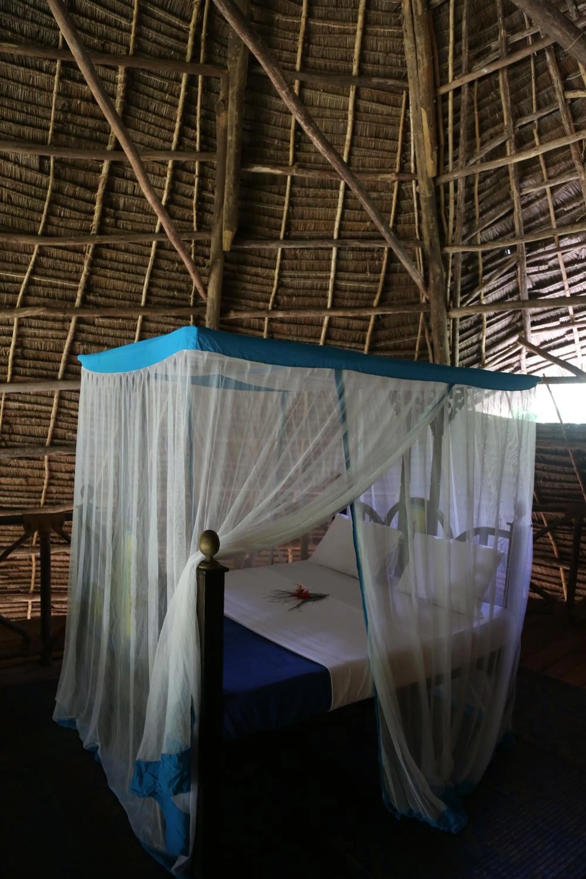 Bed in Unguja Lodge