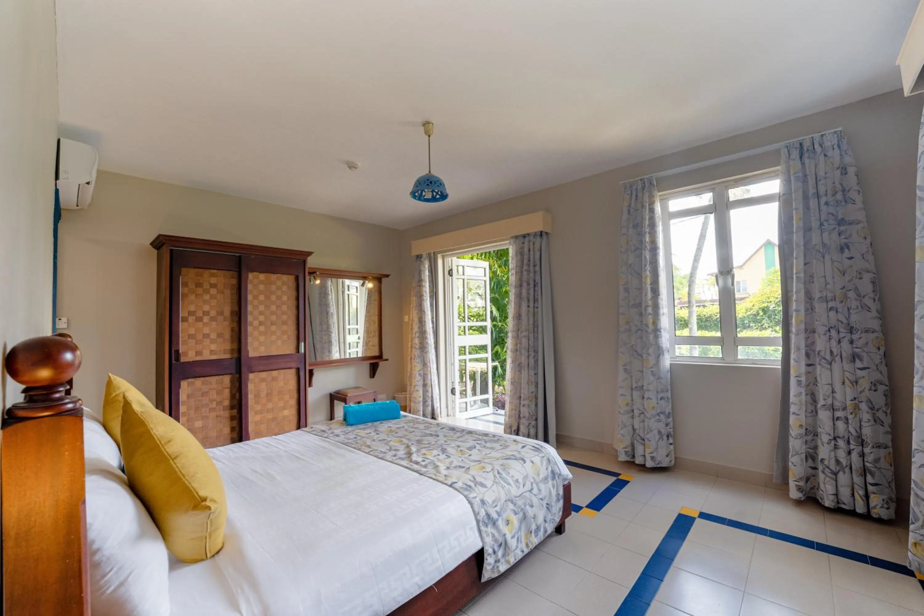 Bed in Le Grand Bleu Hotel