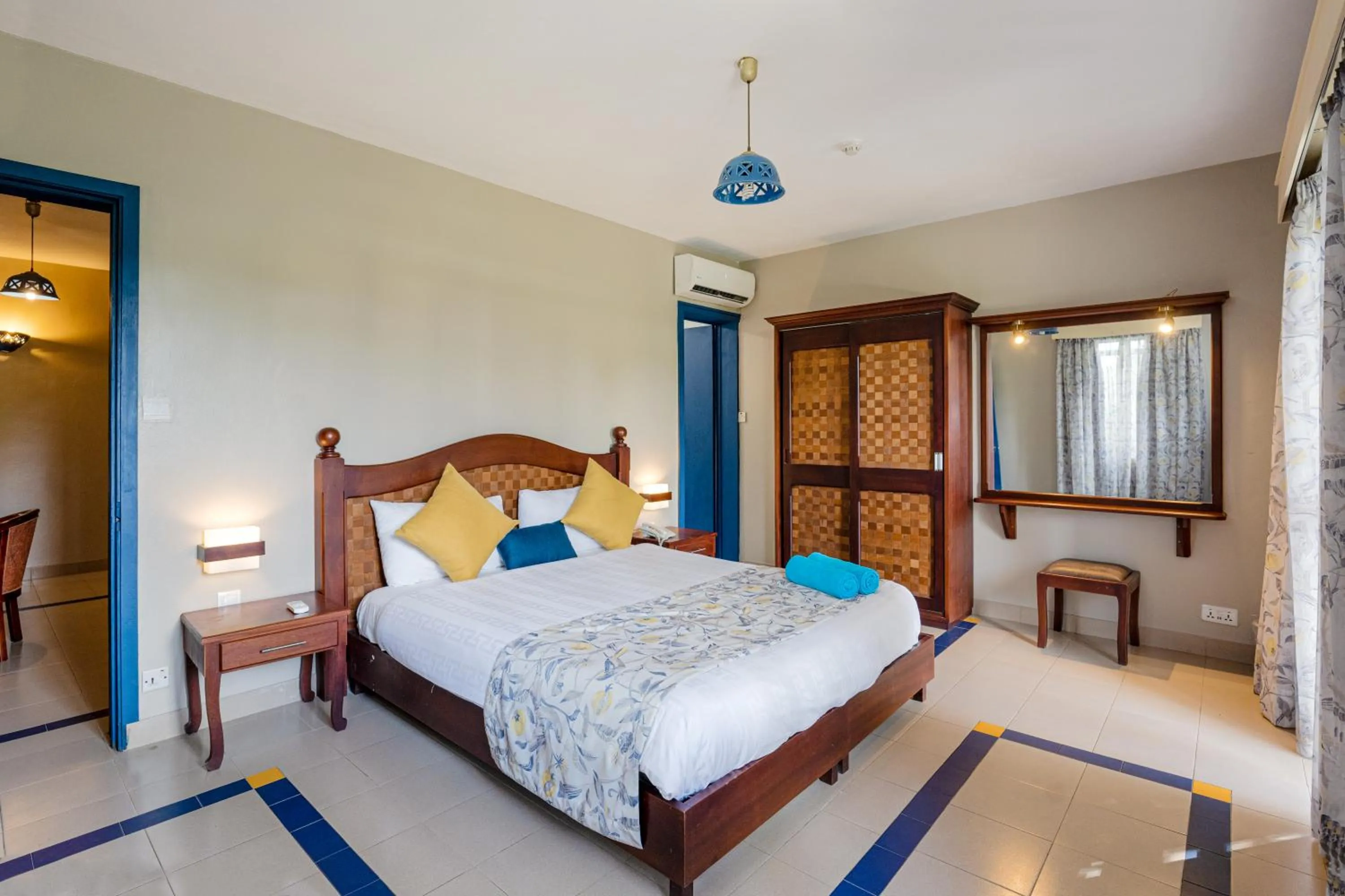 Bed in Le Grand Bleu Hotel