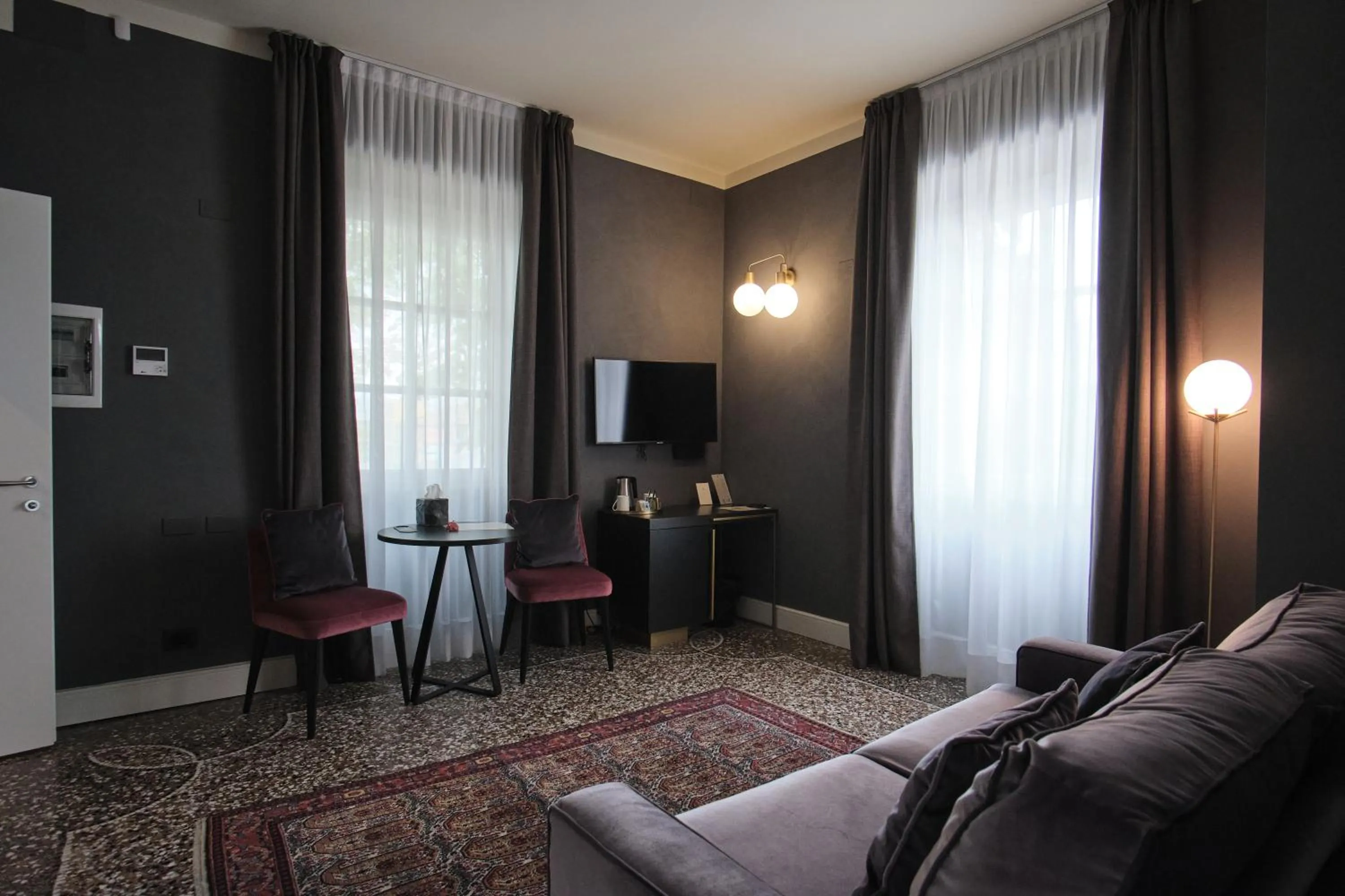 Living room in Capriccio Art Hotel