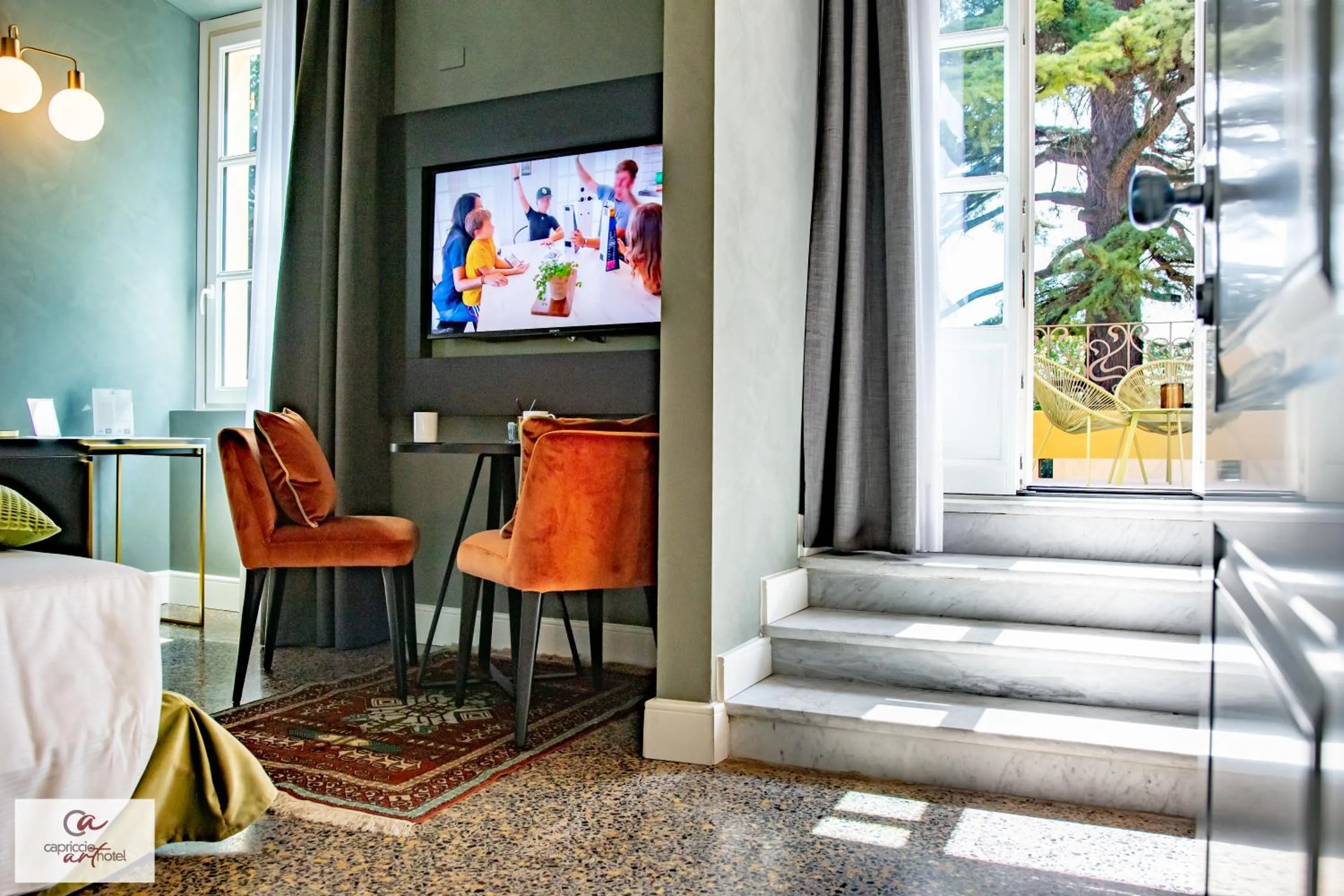 Bedroom in Capriccio Art Hotel