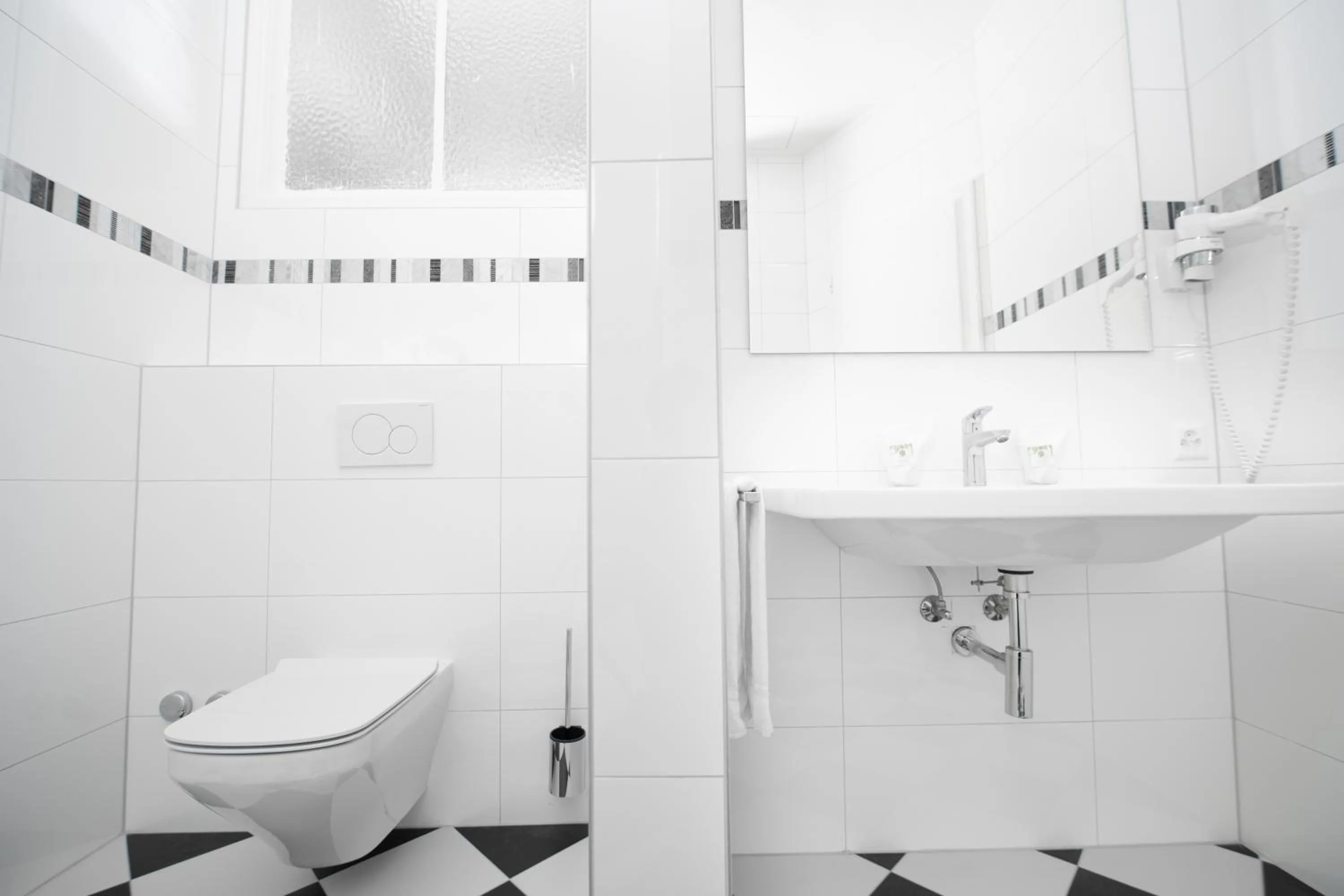 Bathroom in J5 Hotels Helvetie & La Brasserie