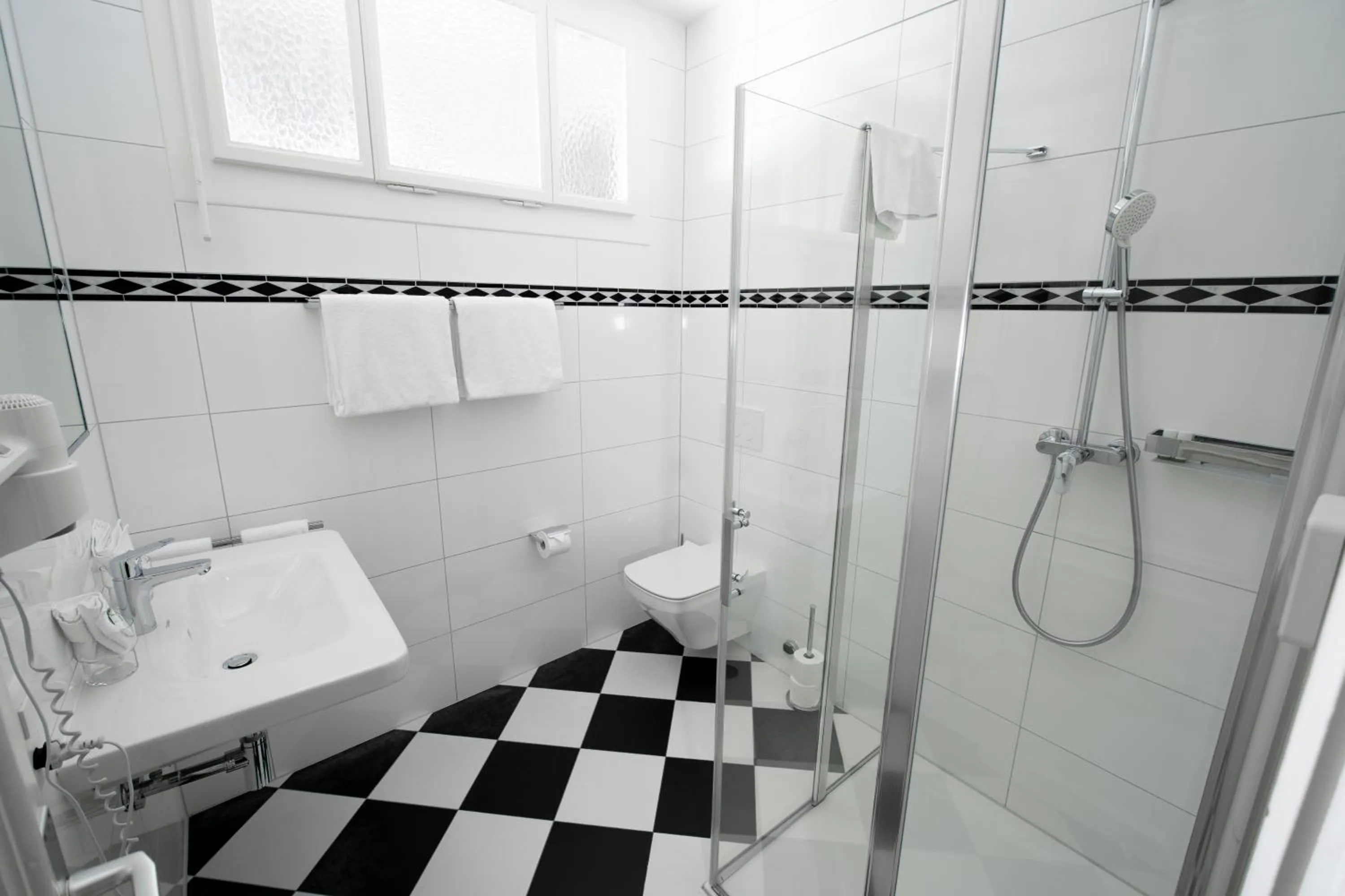 Bathroom in J5 Hotels Helvetie & La Brasserie