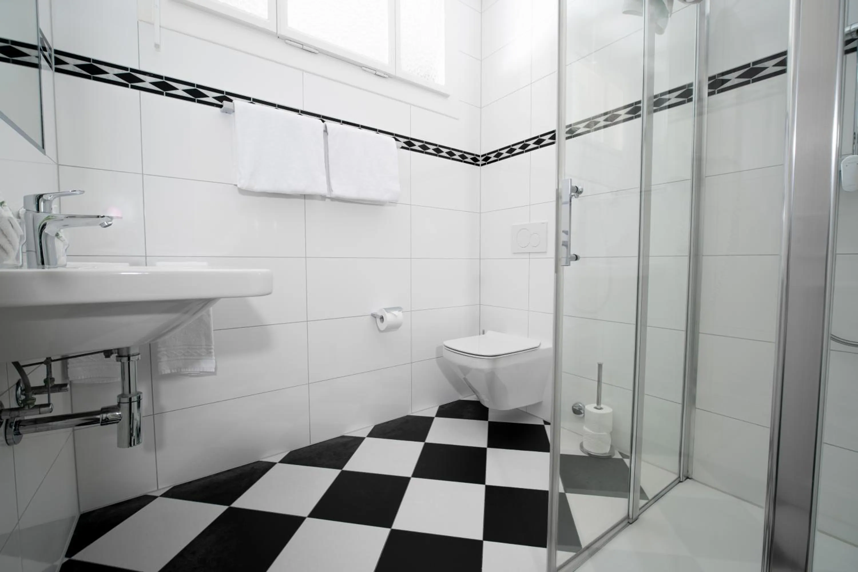 Bathroom in J5 Hotels Helvetie & La Brasserie